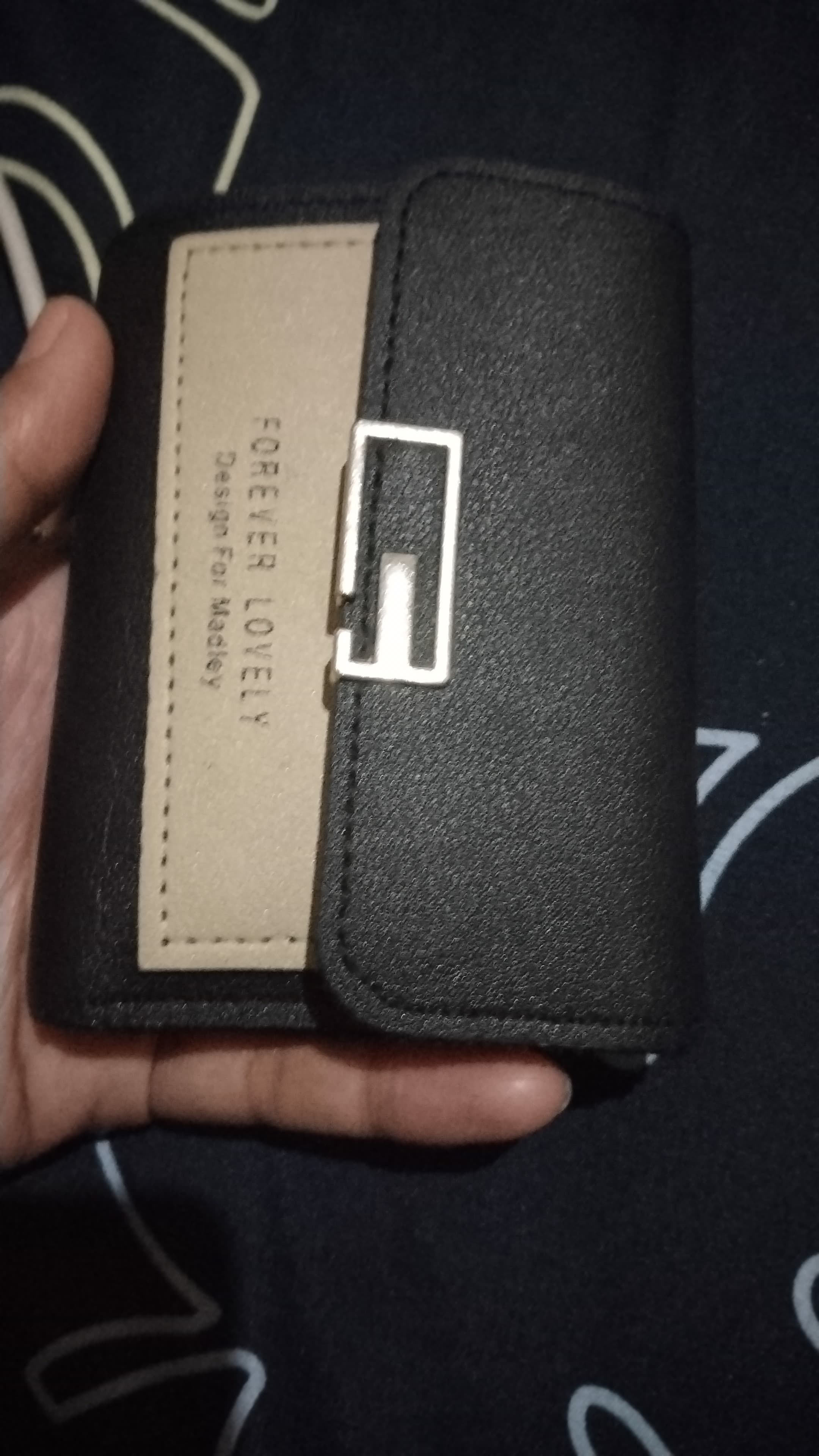 Foto laporan dompet warna hitam (HB6494)