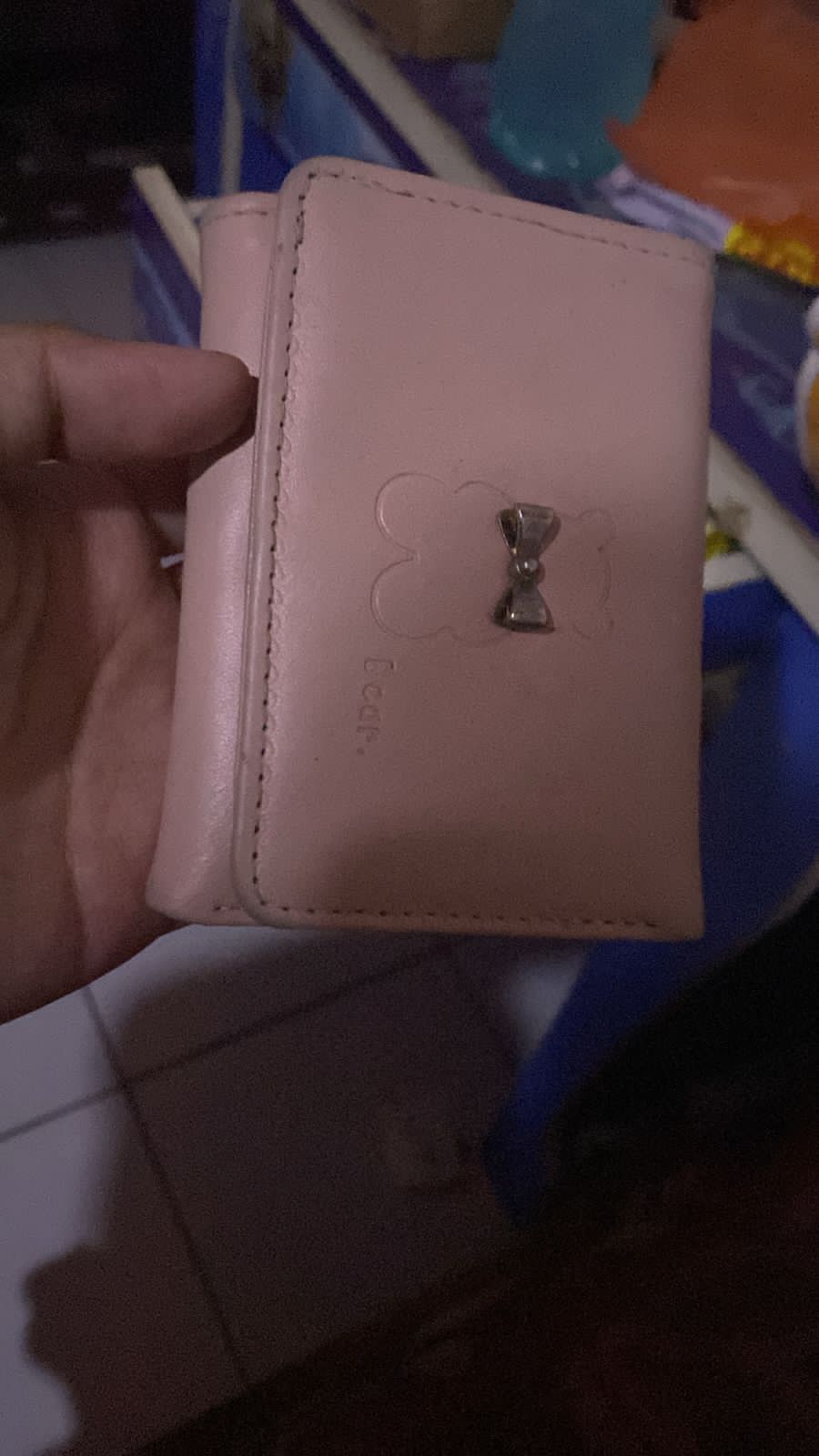 Foto laporan Dompet berwarna pink kecill (HB6625)