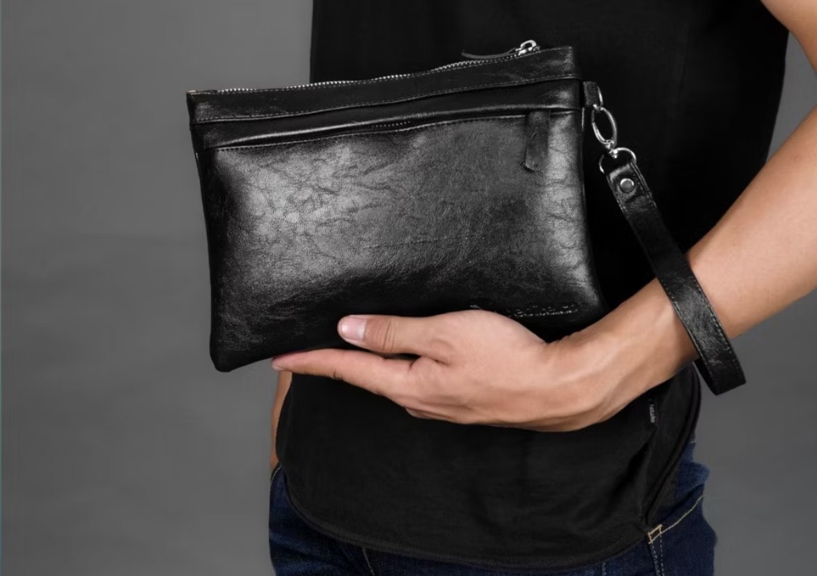 Foto laporan Handbag tas hitam di dalam ada hp xiaomi redmi note 10 pro (HB6678)