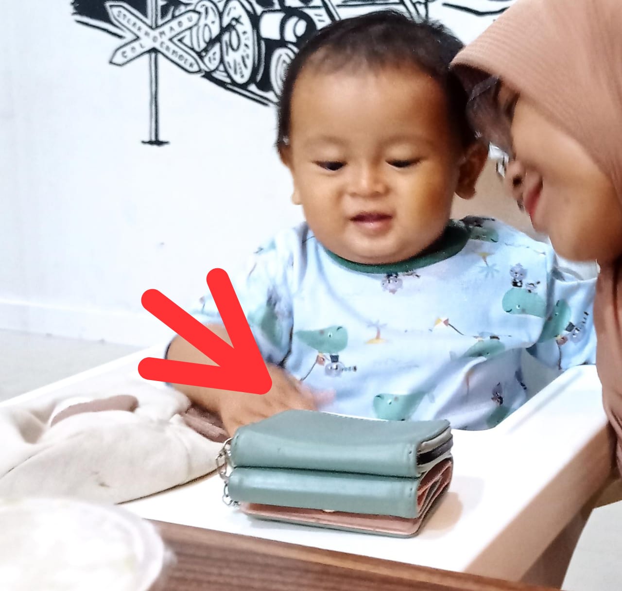Foto laporan Dompet berisi sim, stnk, ktp, kartu atm (HB6687)