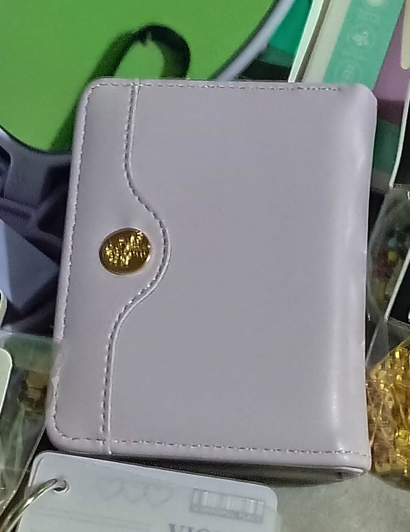 Foto laporan dompet ungu (HB6728)