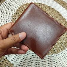 Foto laporan dompet warna coklat (HB6759)