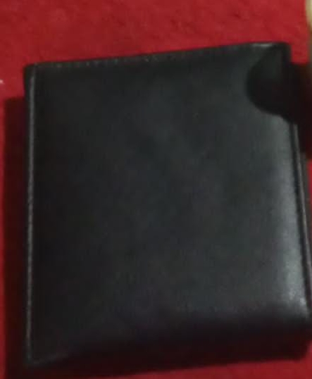 Foto laporan Dompet warna hitam (HB7012)