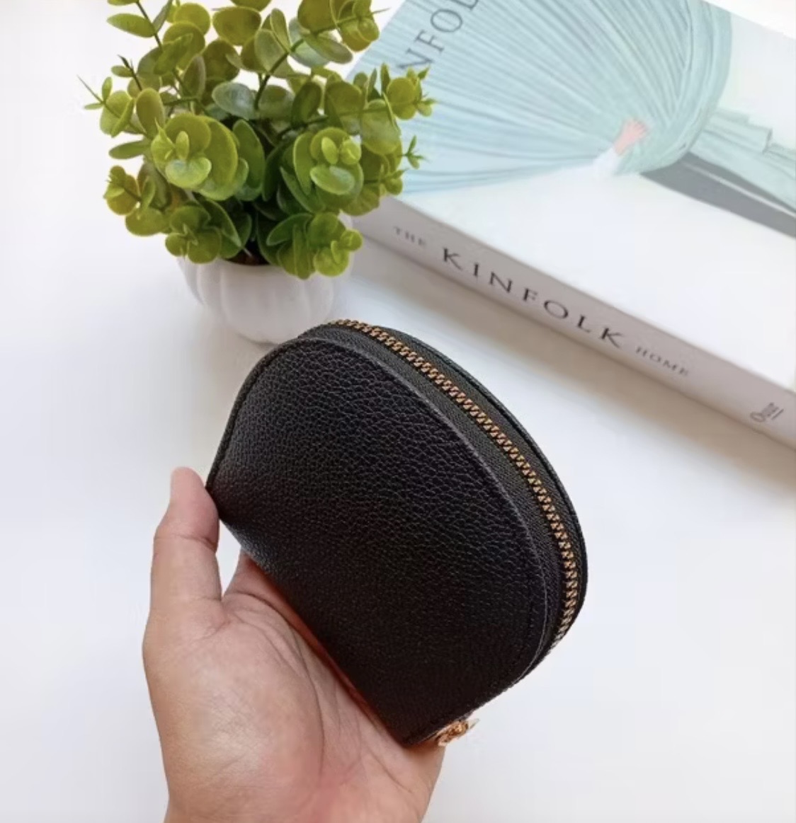 Foto laporan Dompet berwarna hitam (HB7228)