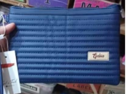 Foto laporan dompet biru (HB7260)