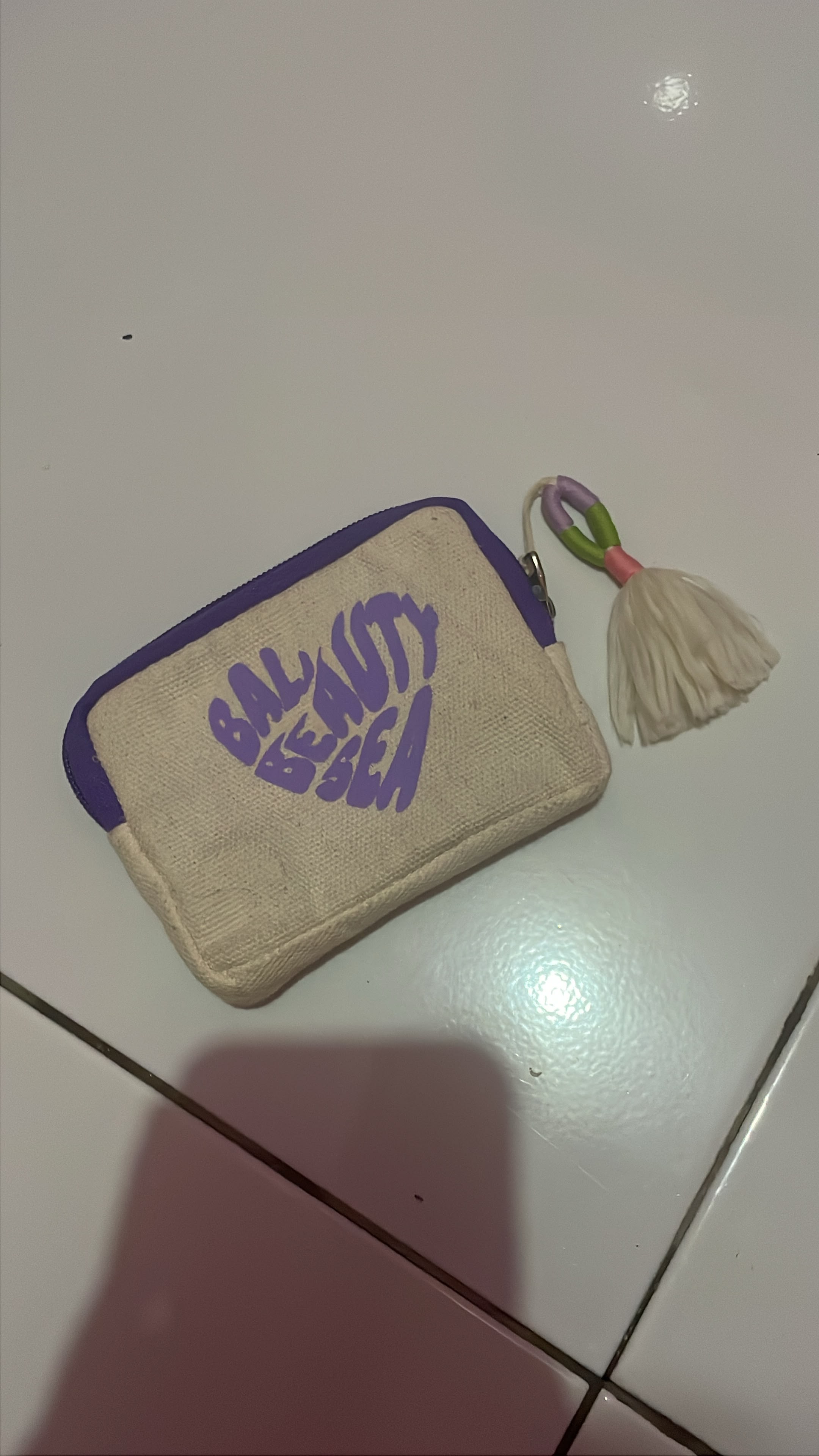 Foto laporan Dompet kanvas kecil warna ungu (HB7316)