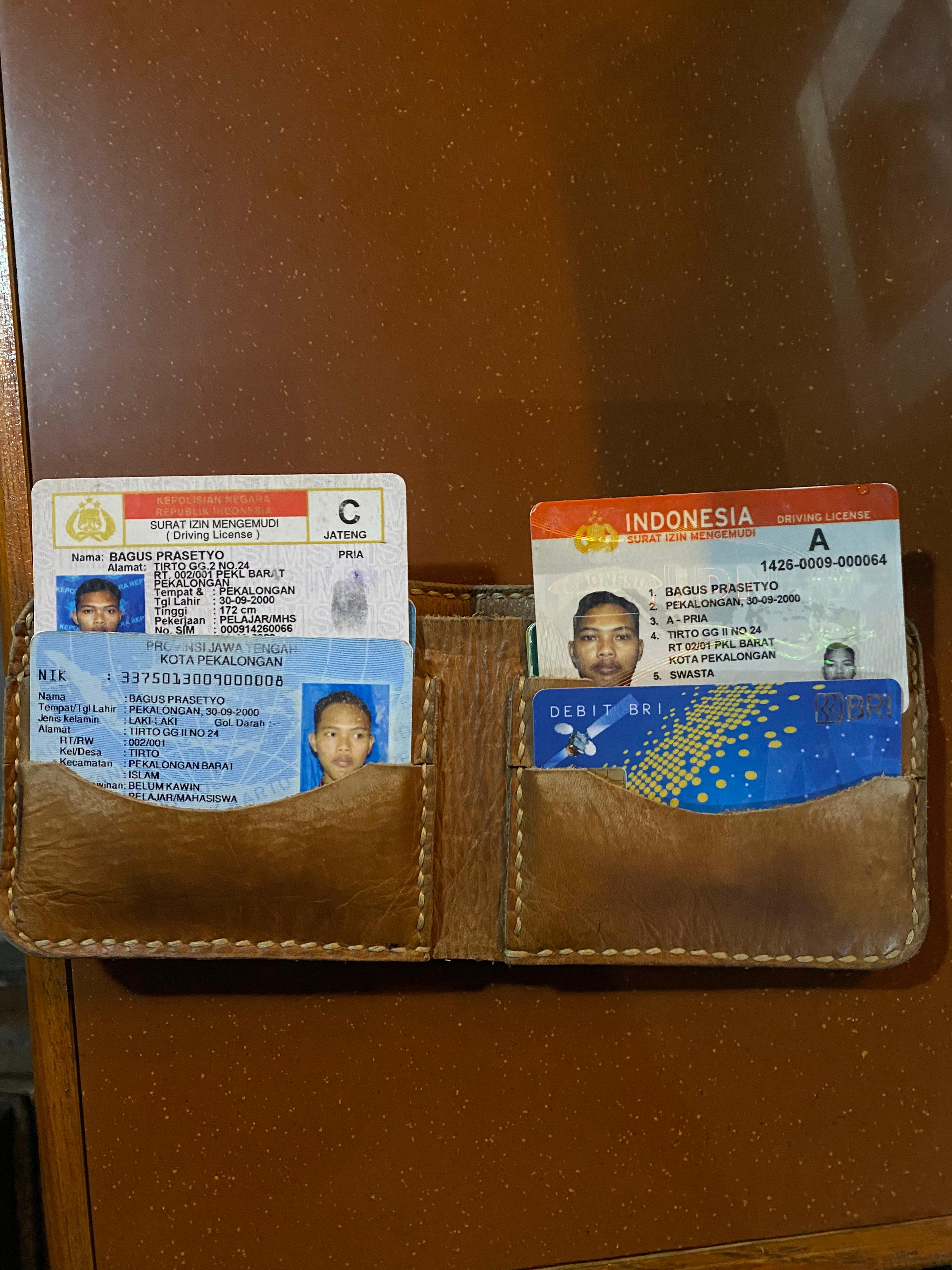Foto laporan Dompet (TB0003)