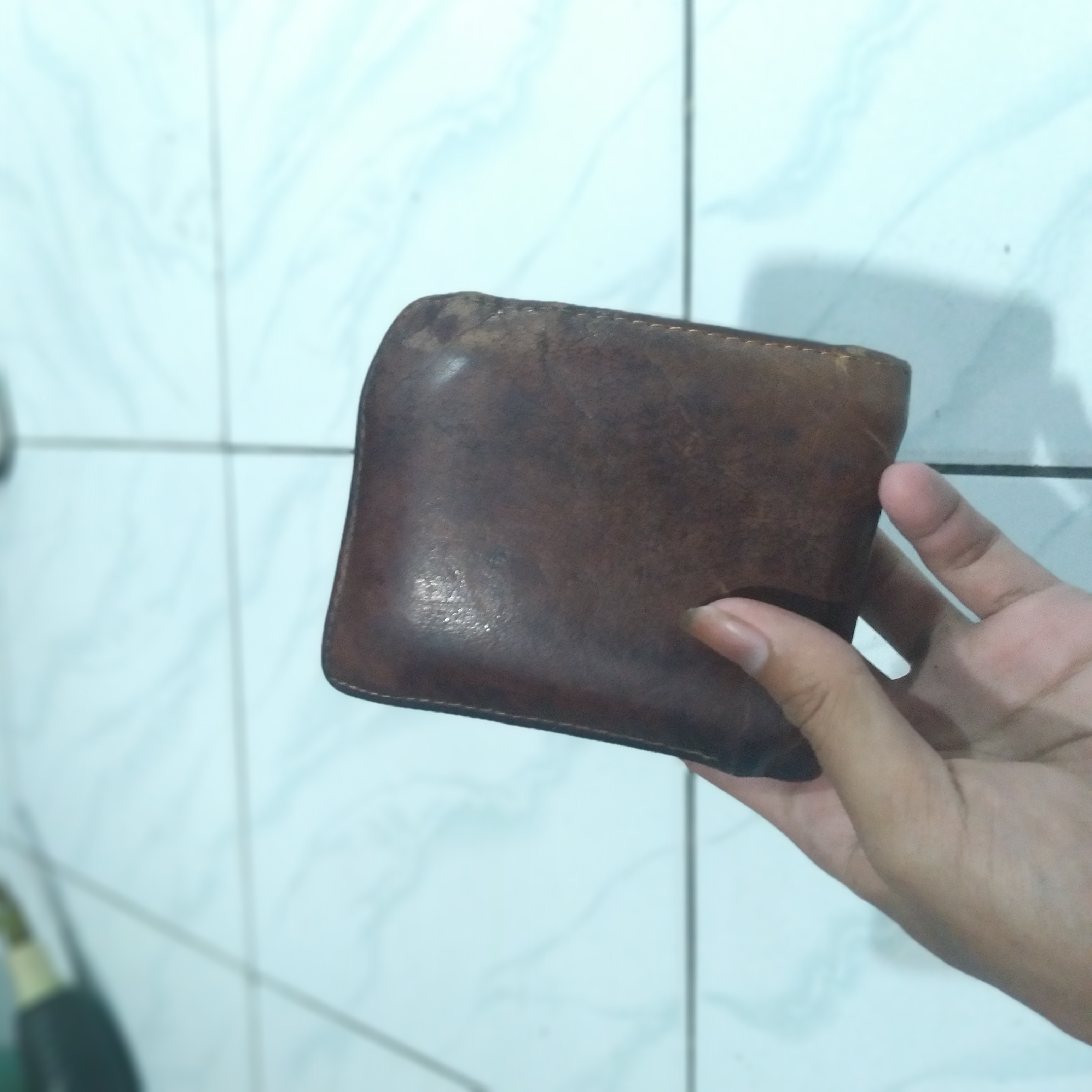Foto laporan Dompet (TB0027)