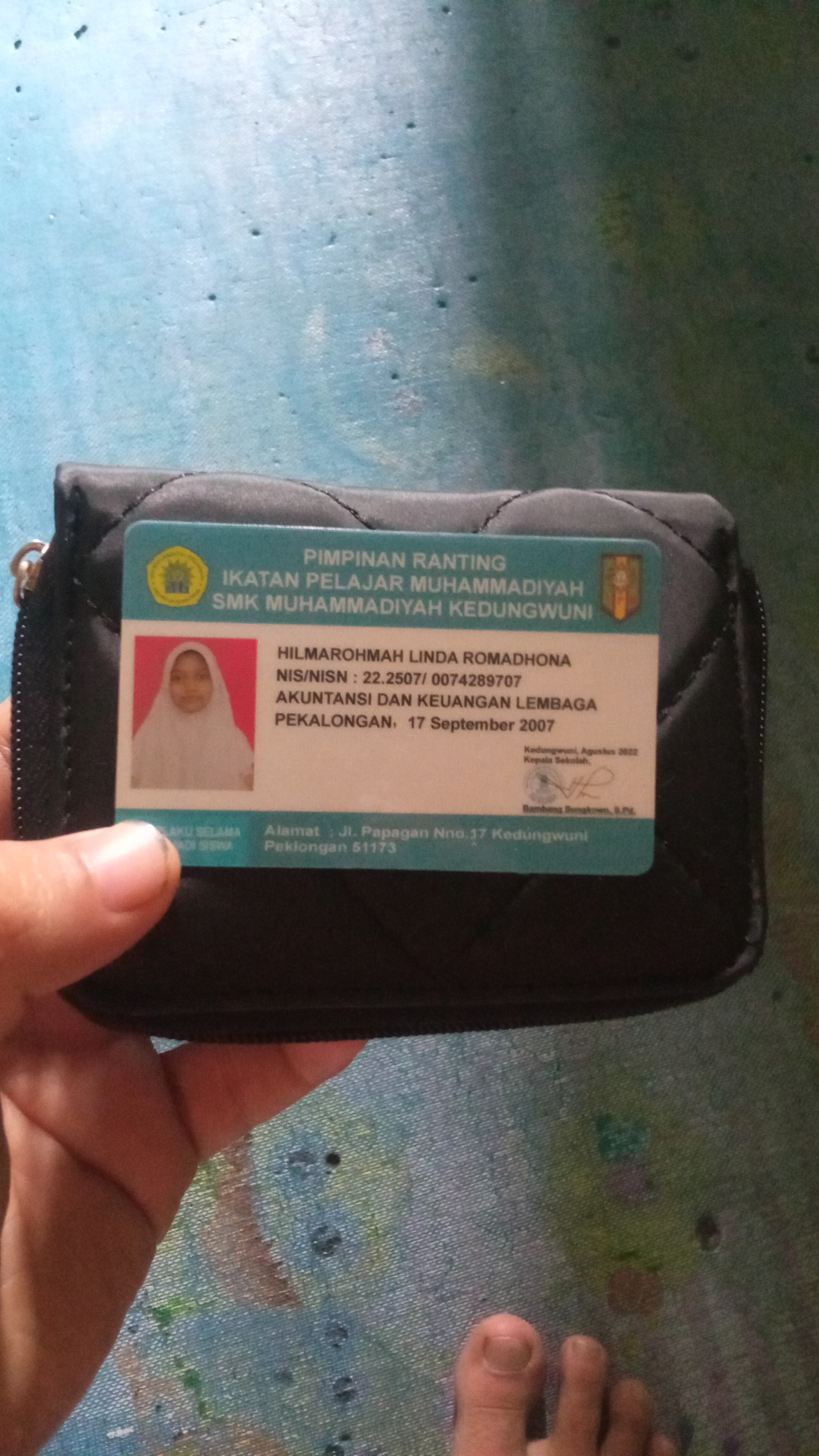 Foto laporan dompet (TB0054)