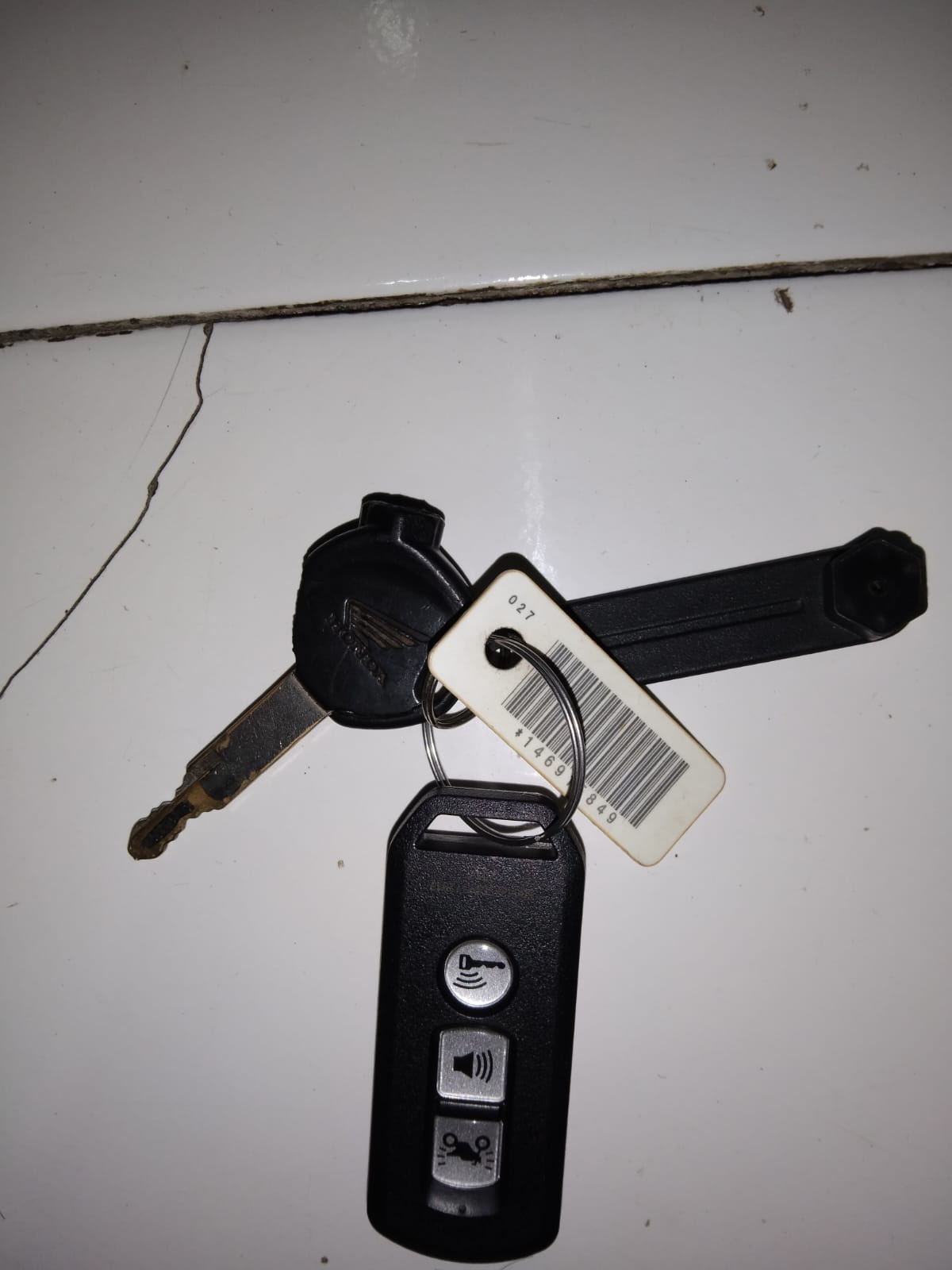 Foto laporan kunci motor (TB0058)