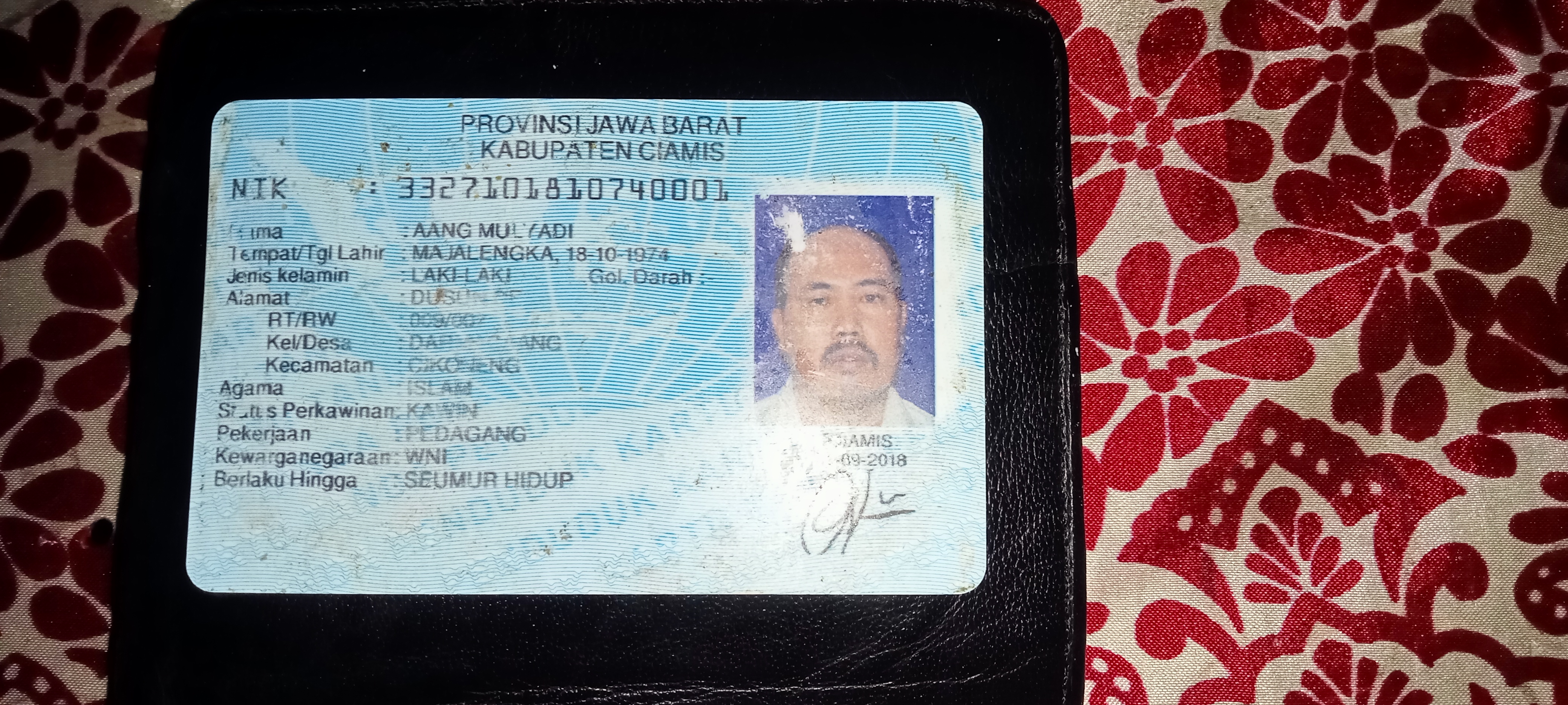 Foto laporan Dompet (TB0073)