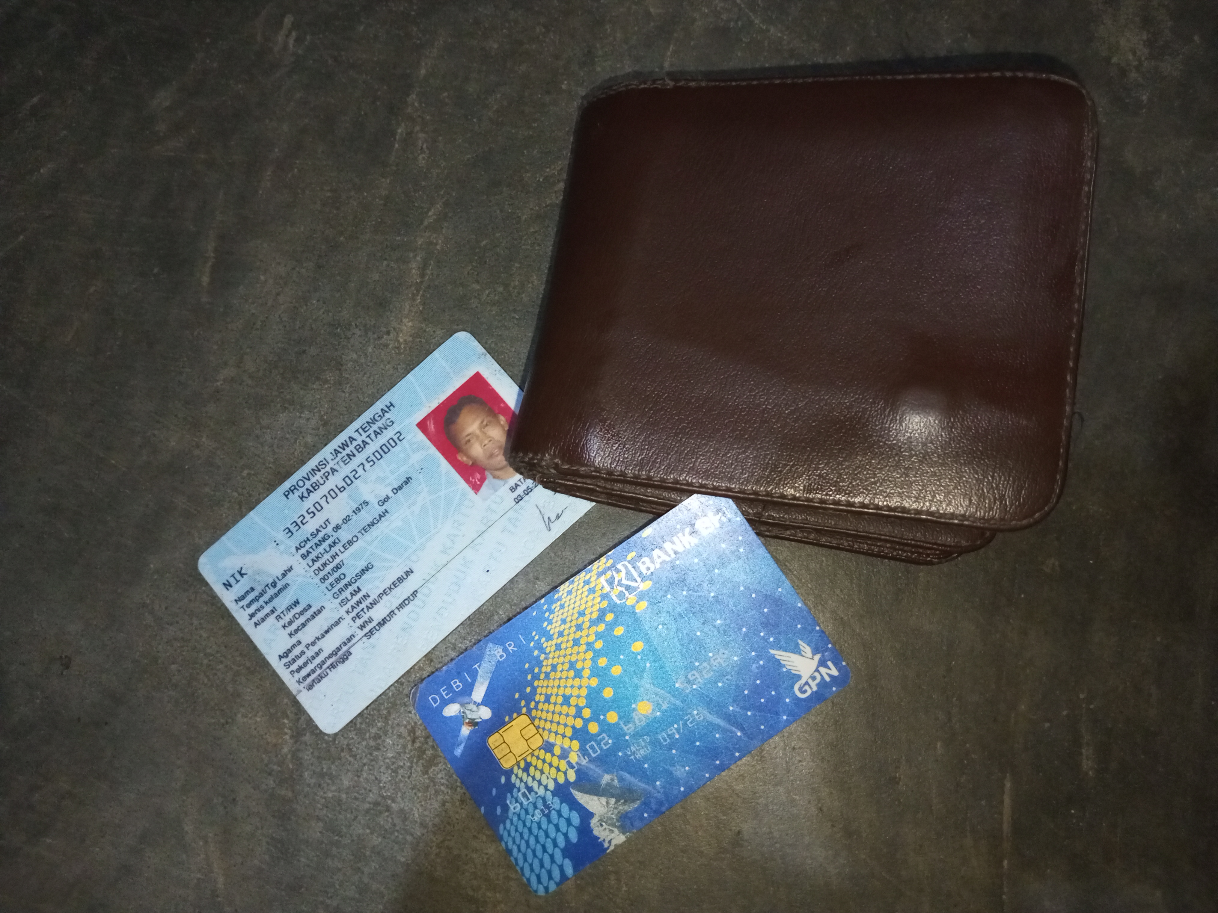 Foto laporan Dompet (TB0077)