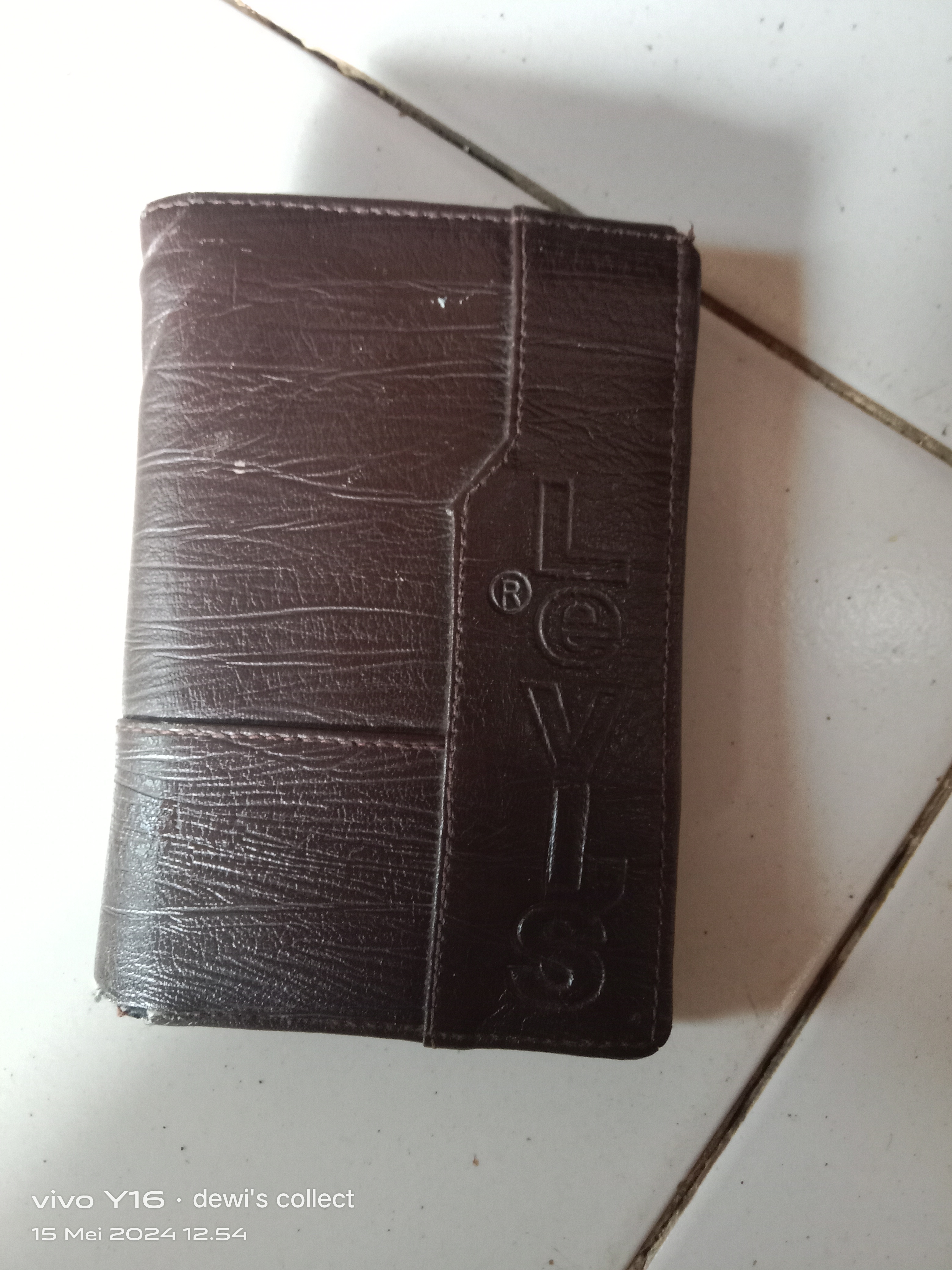 Foto laporan Dompet warna coklat (TB0086)