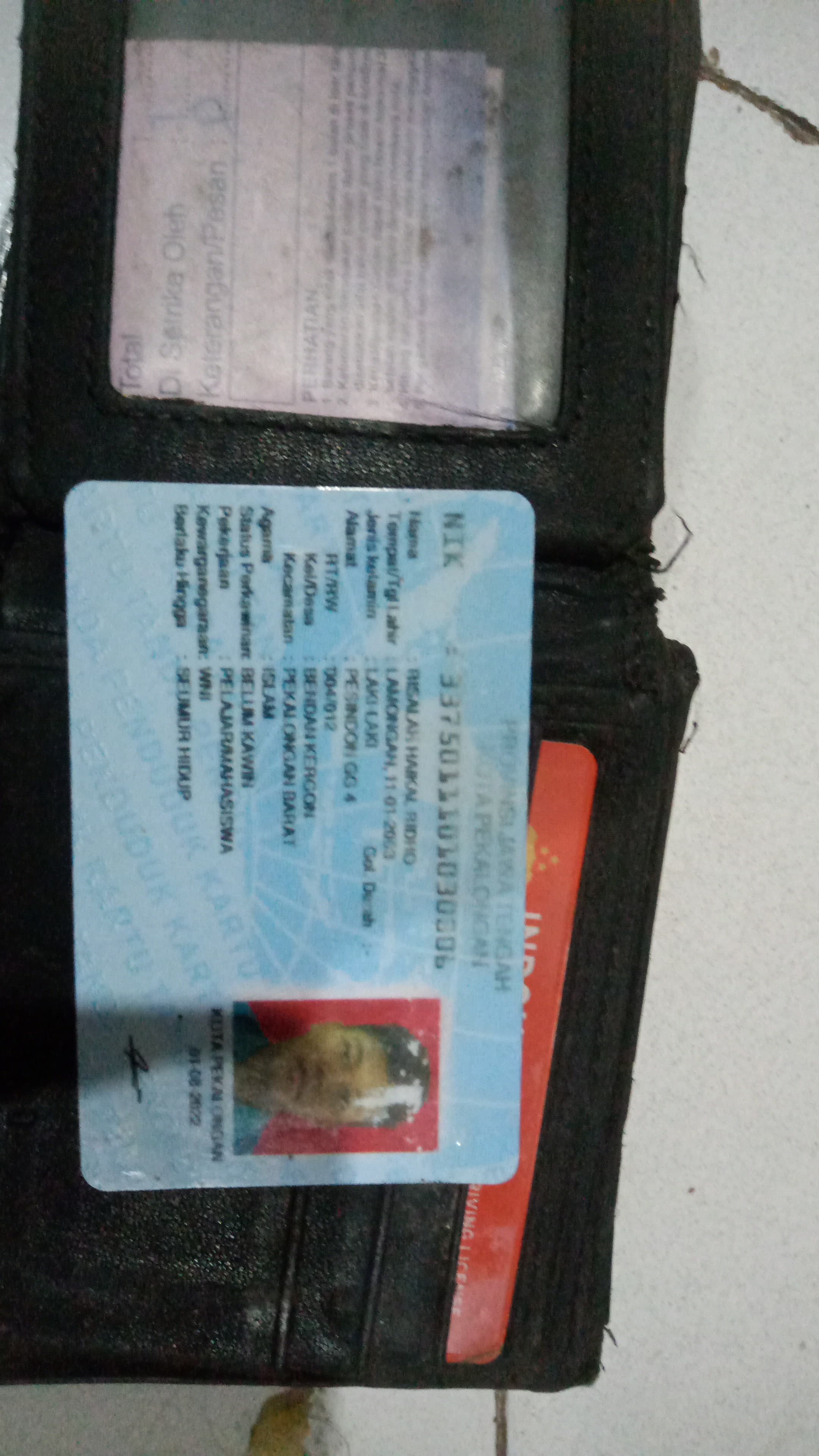 Foto laporan Dompet (TB0094)