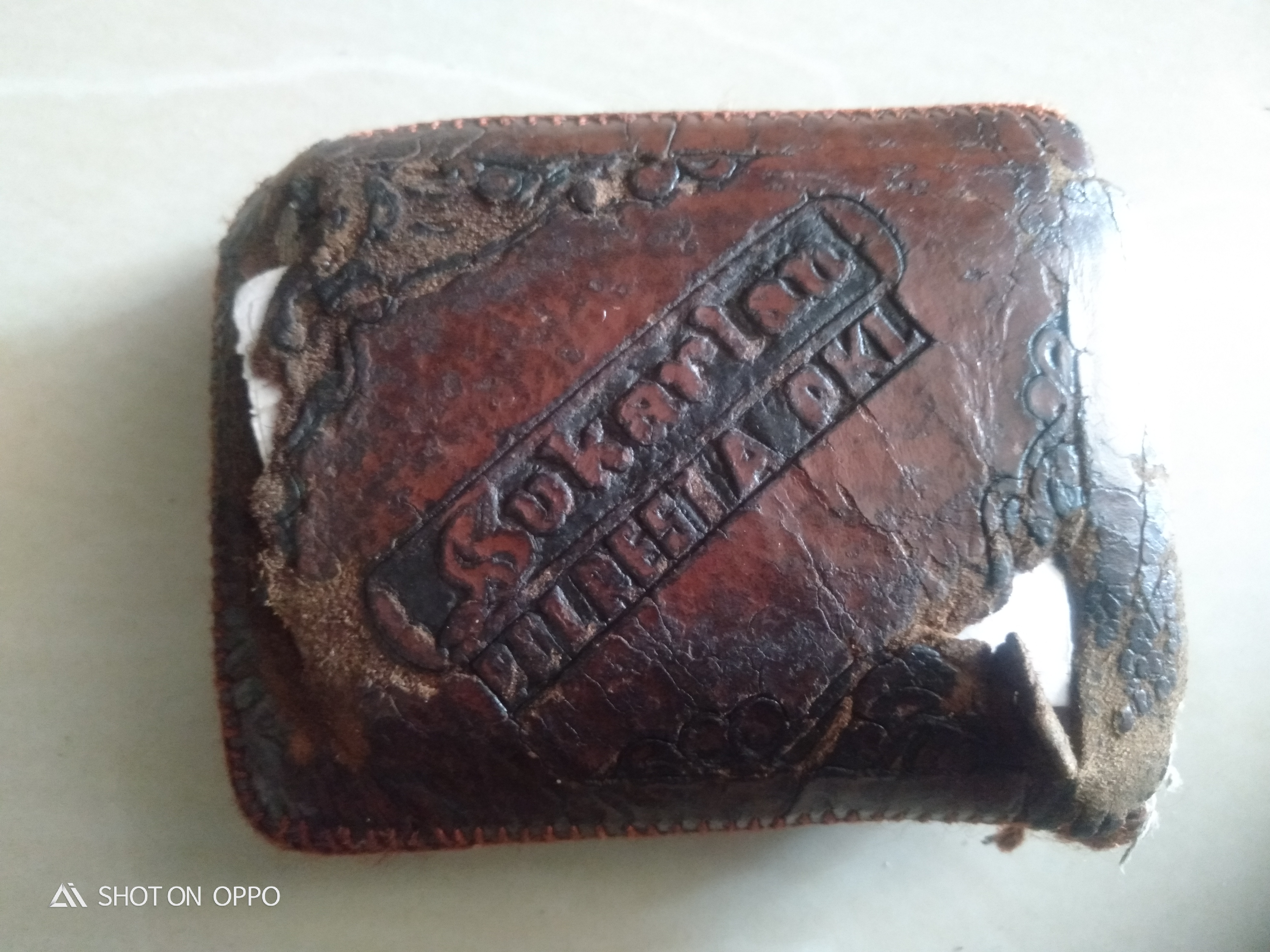 Foto laporan Dompet warna coklat Sim A Sim C Atm kartu bpjs kartu ptg lainya (TB0109)