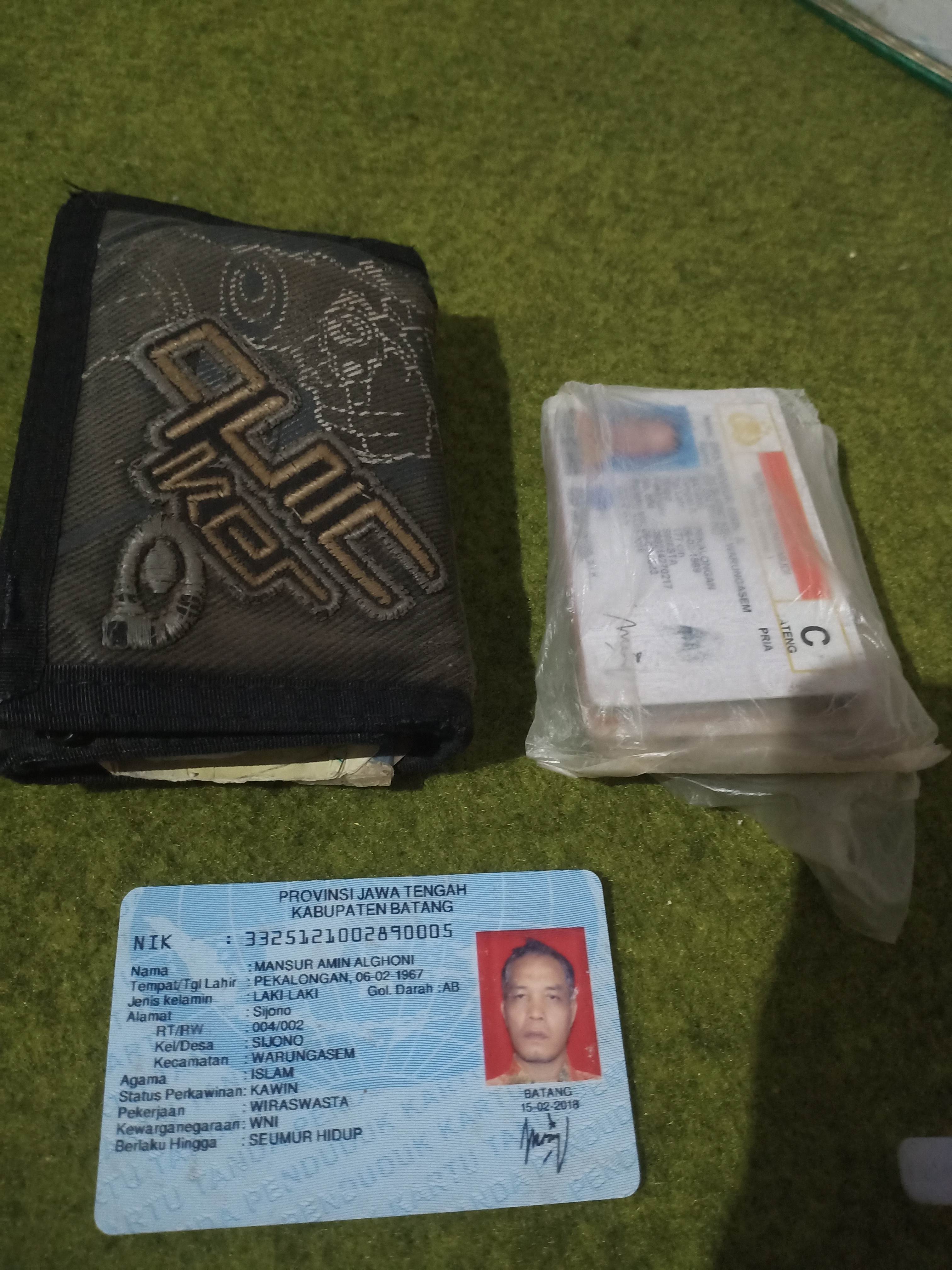 Foto laporan Dompet (TB0131)
