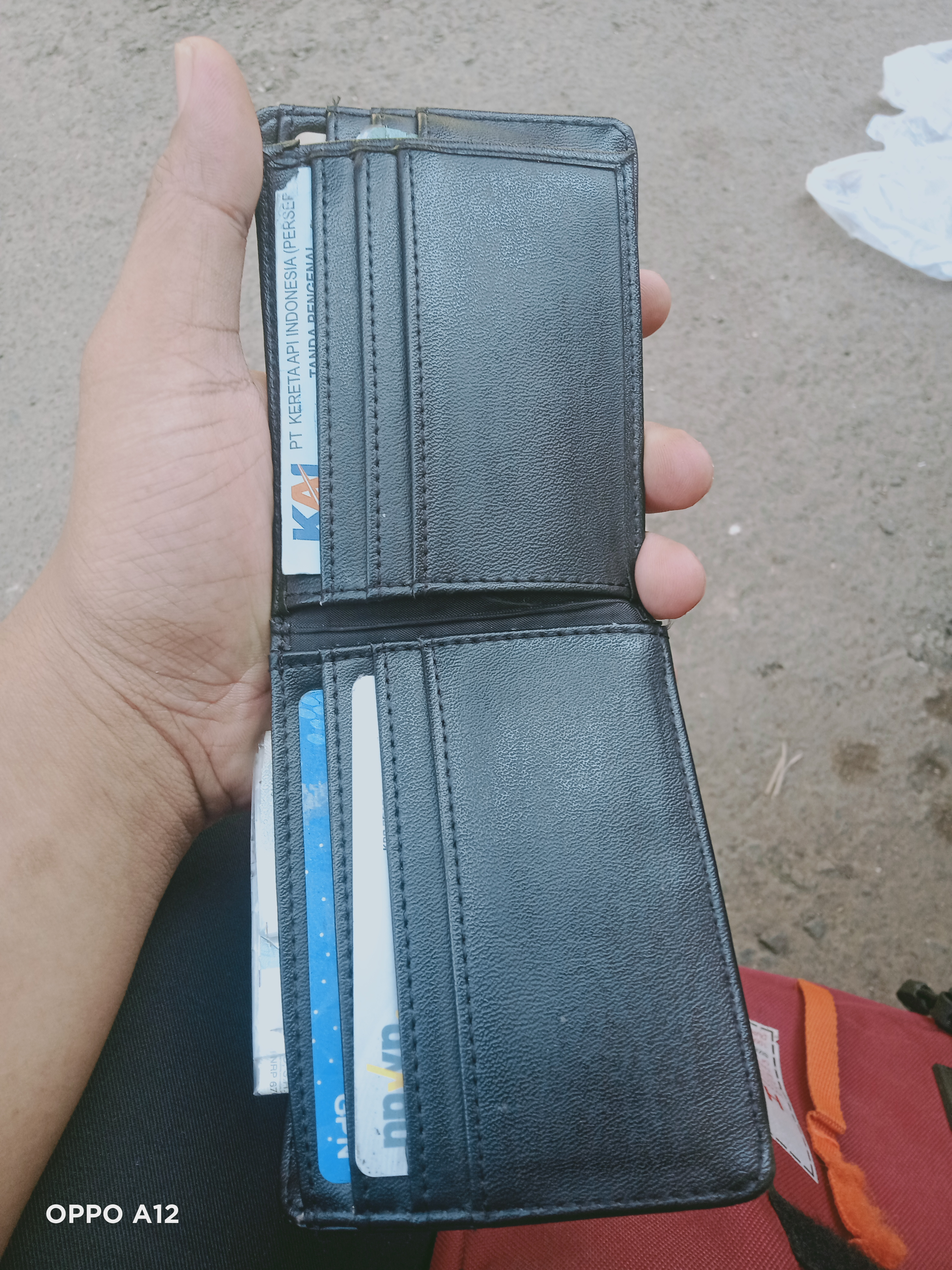 Foto laporan Dompet (TB0142)