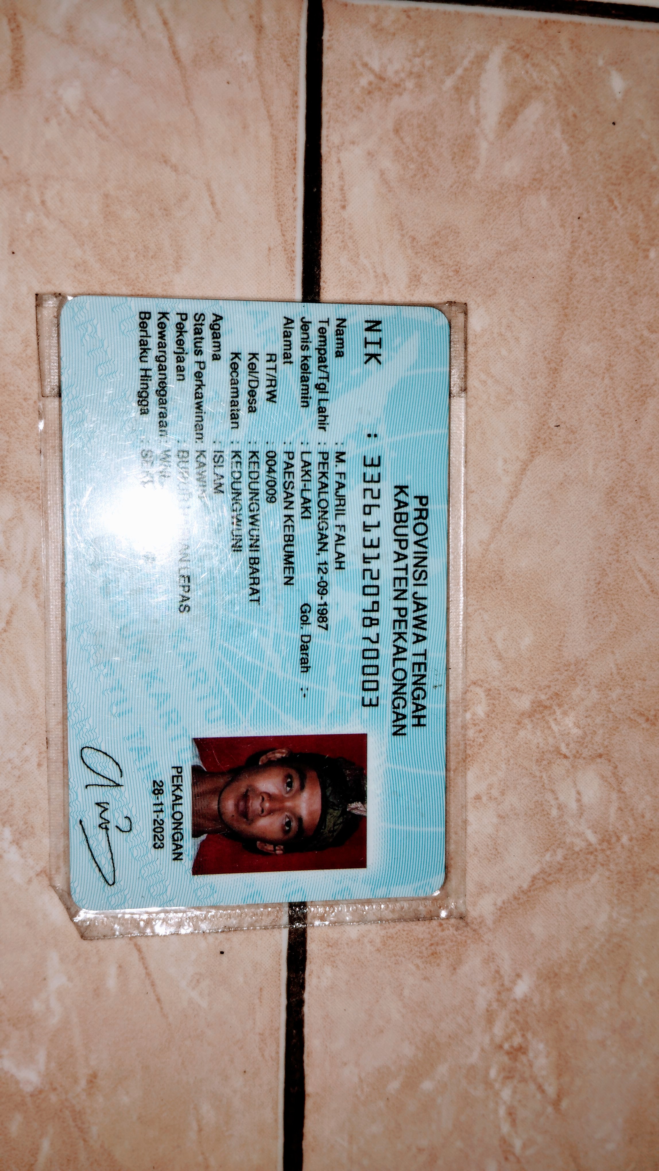 Foto laporan ktp (TB0185)