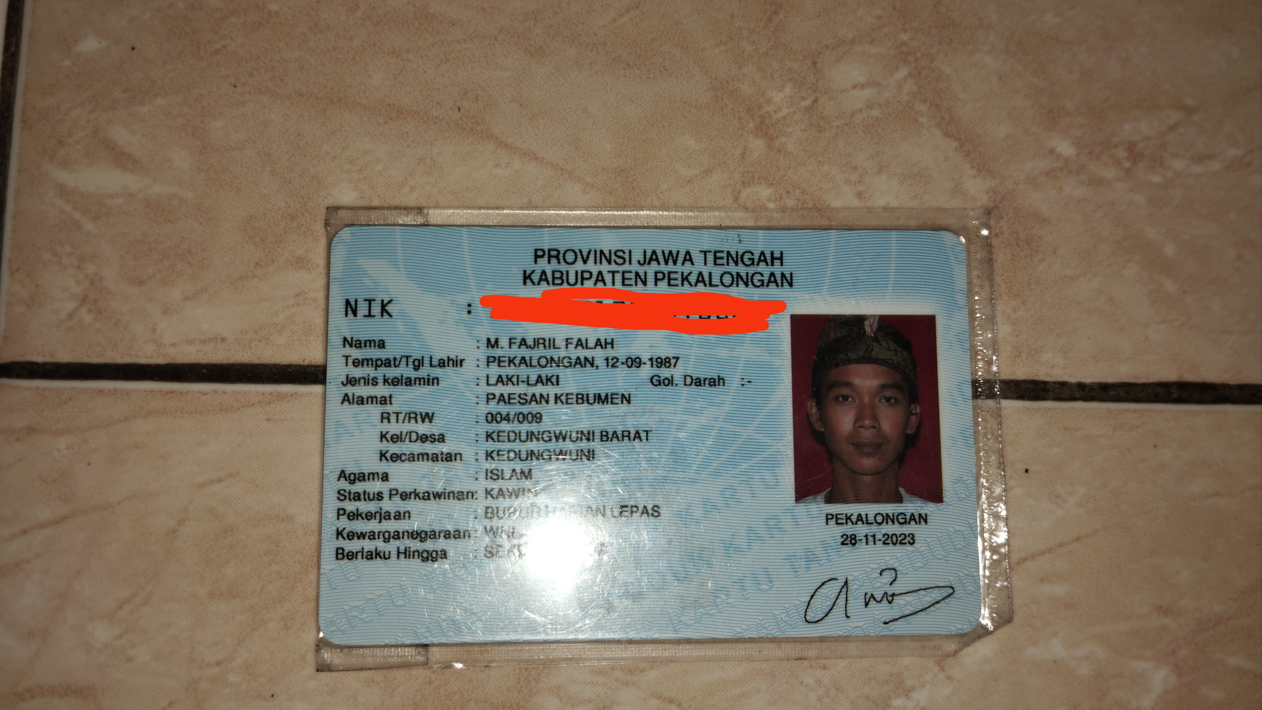 Foto laporan ktp (TB0186)