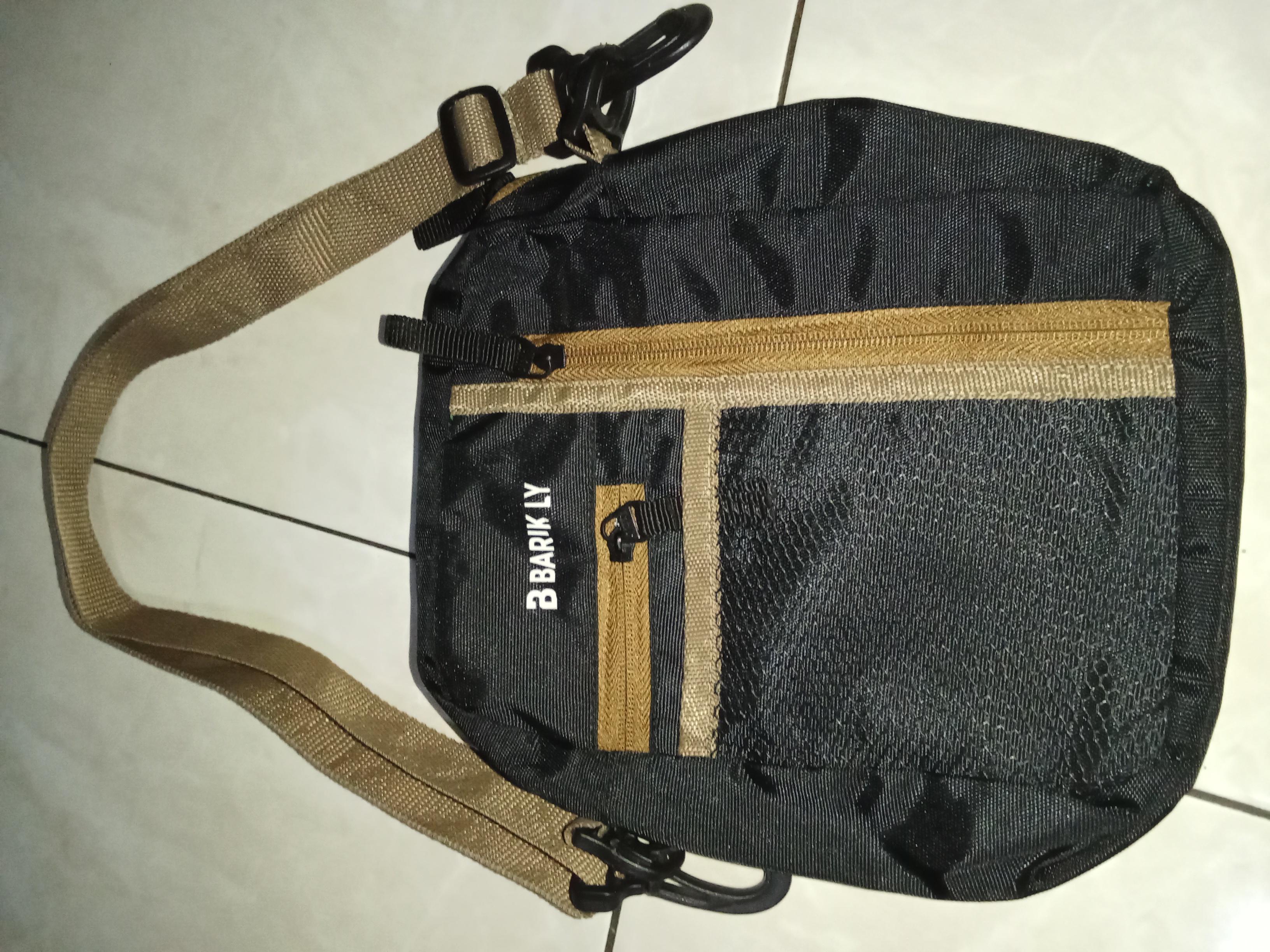 Foto laporan Tas hitam coklat (TB0210)