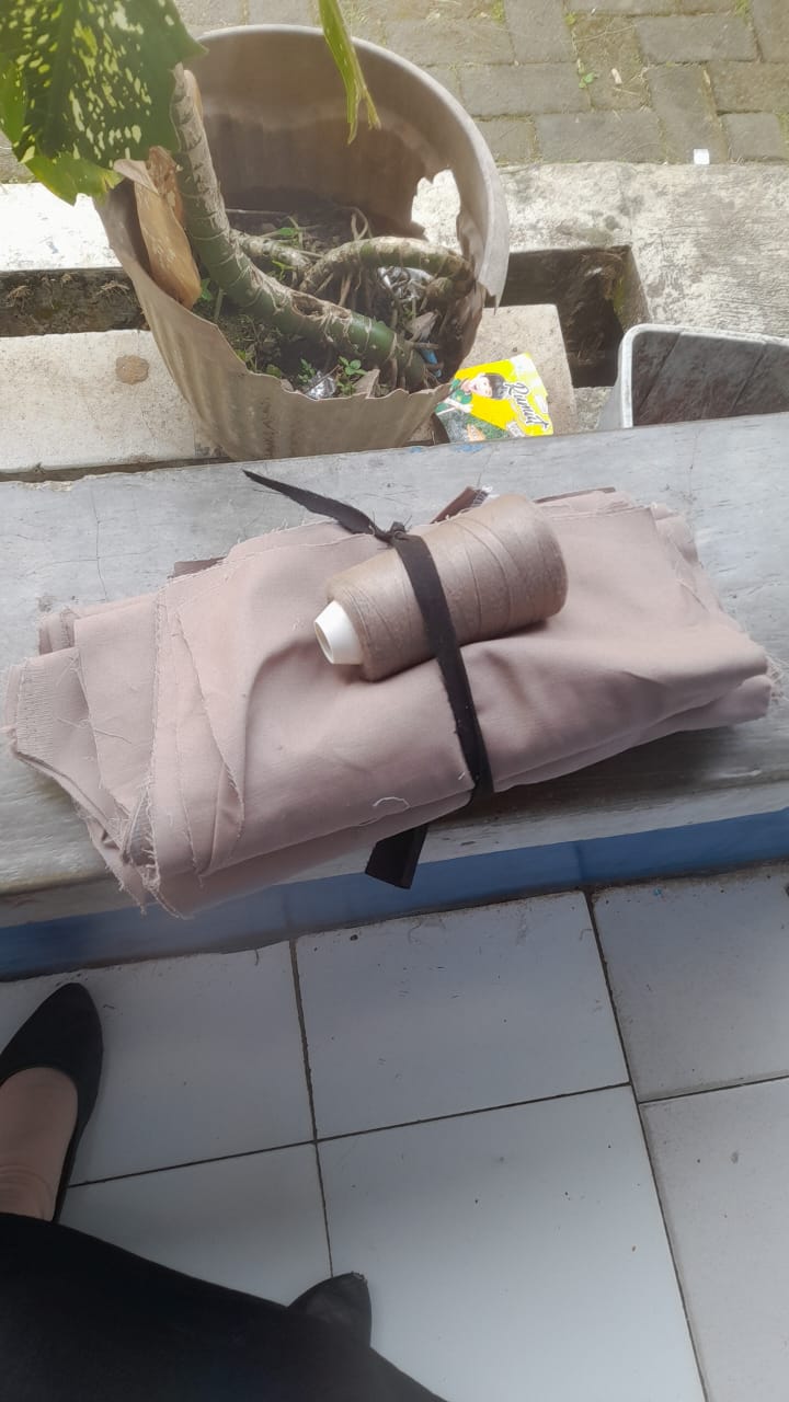 Foto laporan potongan bahan dan benang (TB0256)