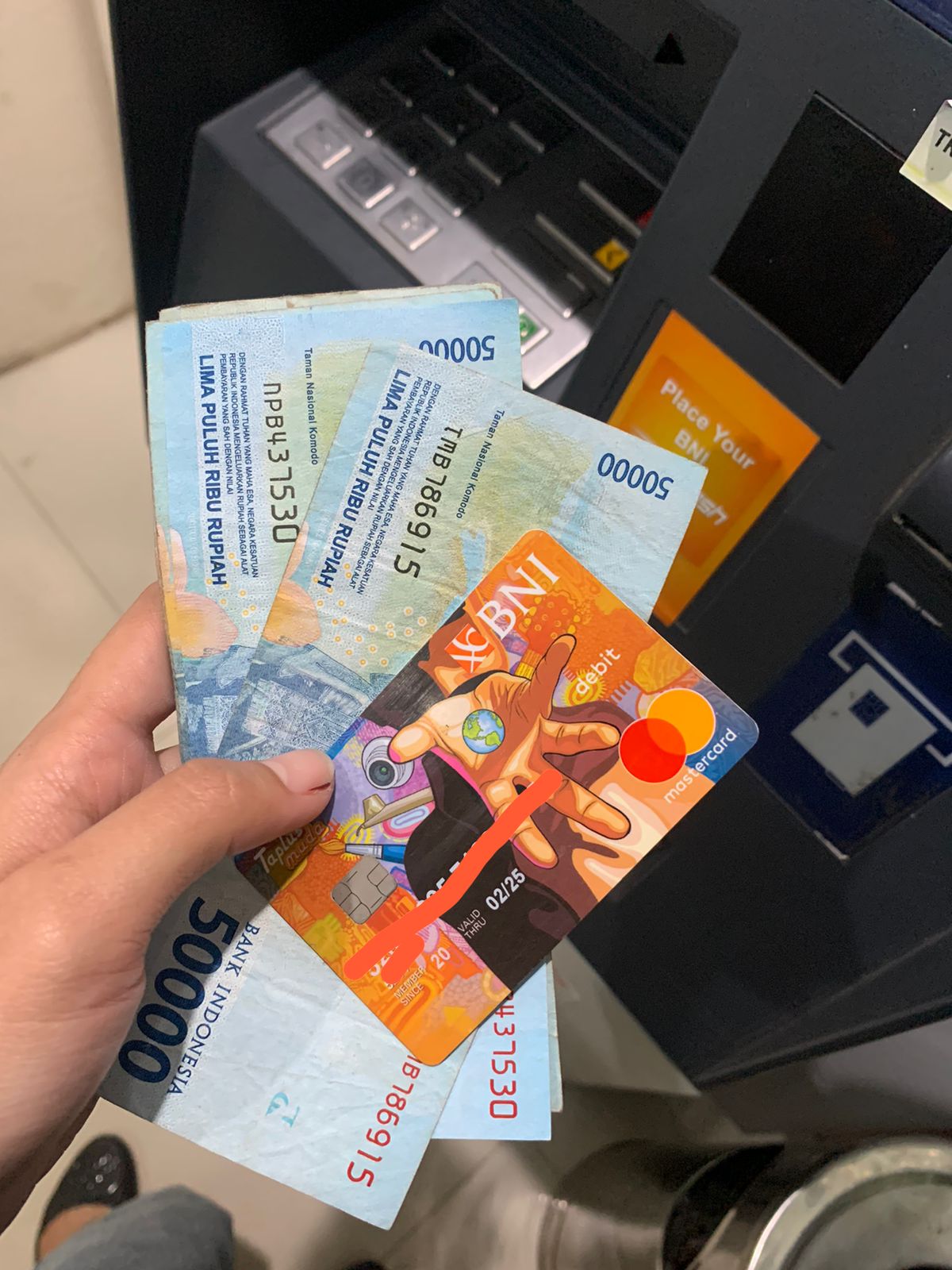 Foto laporan ATM dan uang tunai (TB0300)