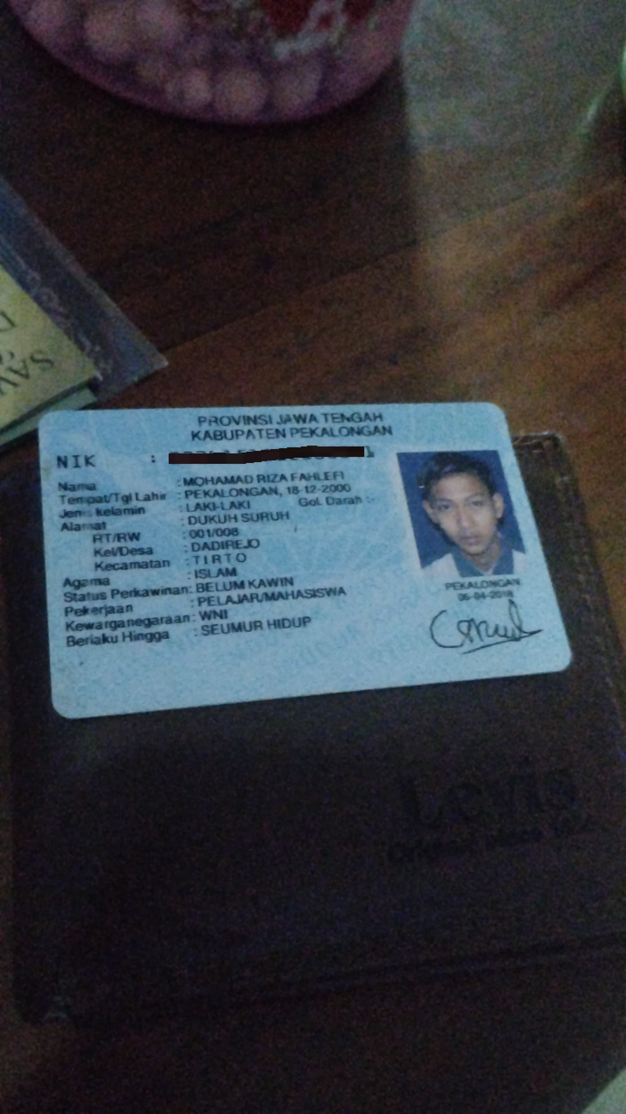 Foto laporan dompet (TB0340)