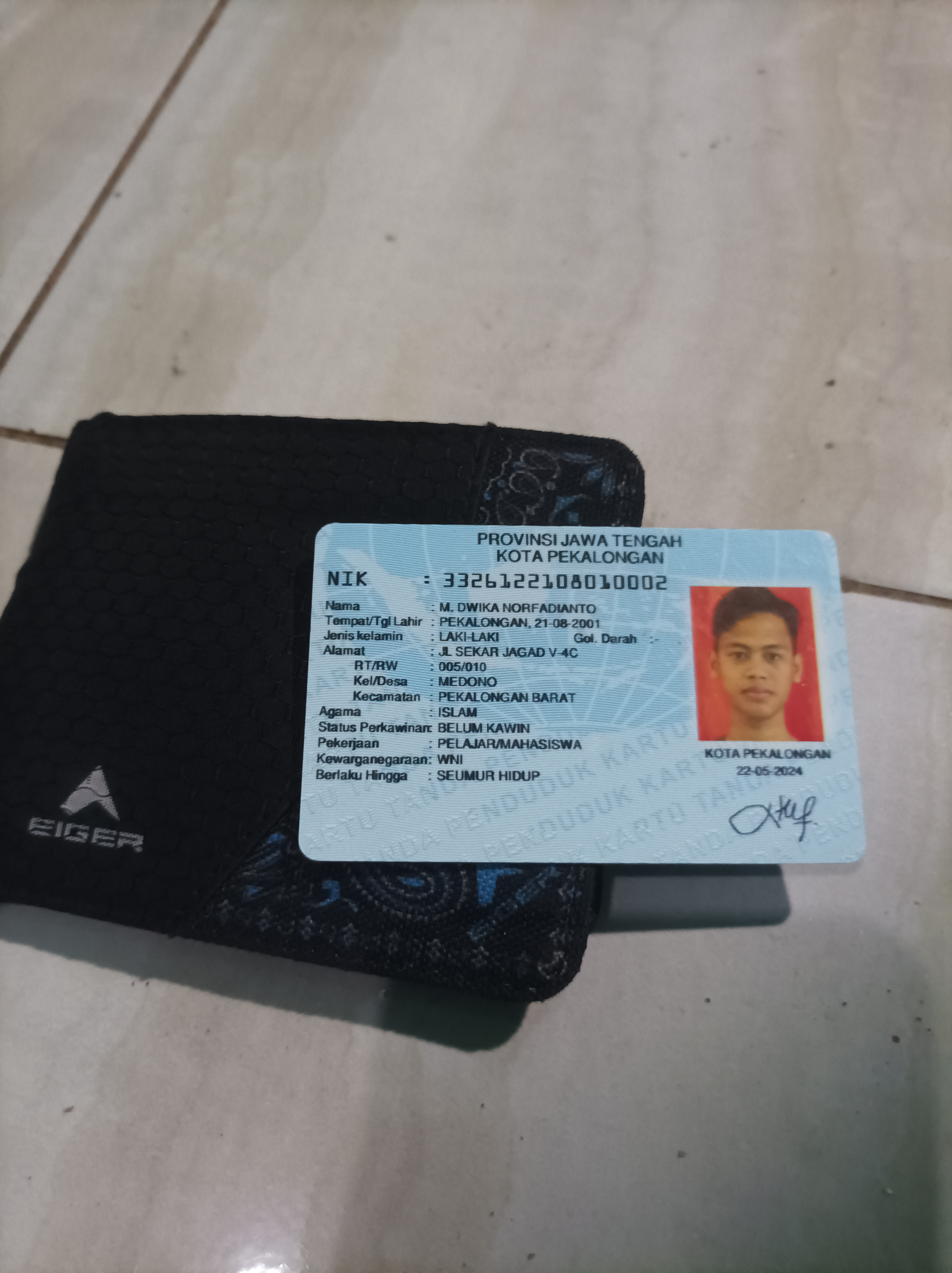 Foto laporan Dompet (TB0354)
