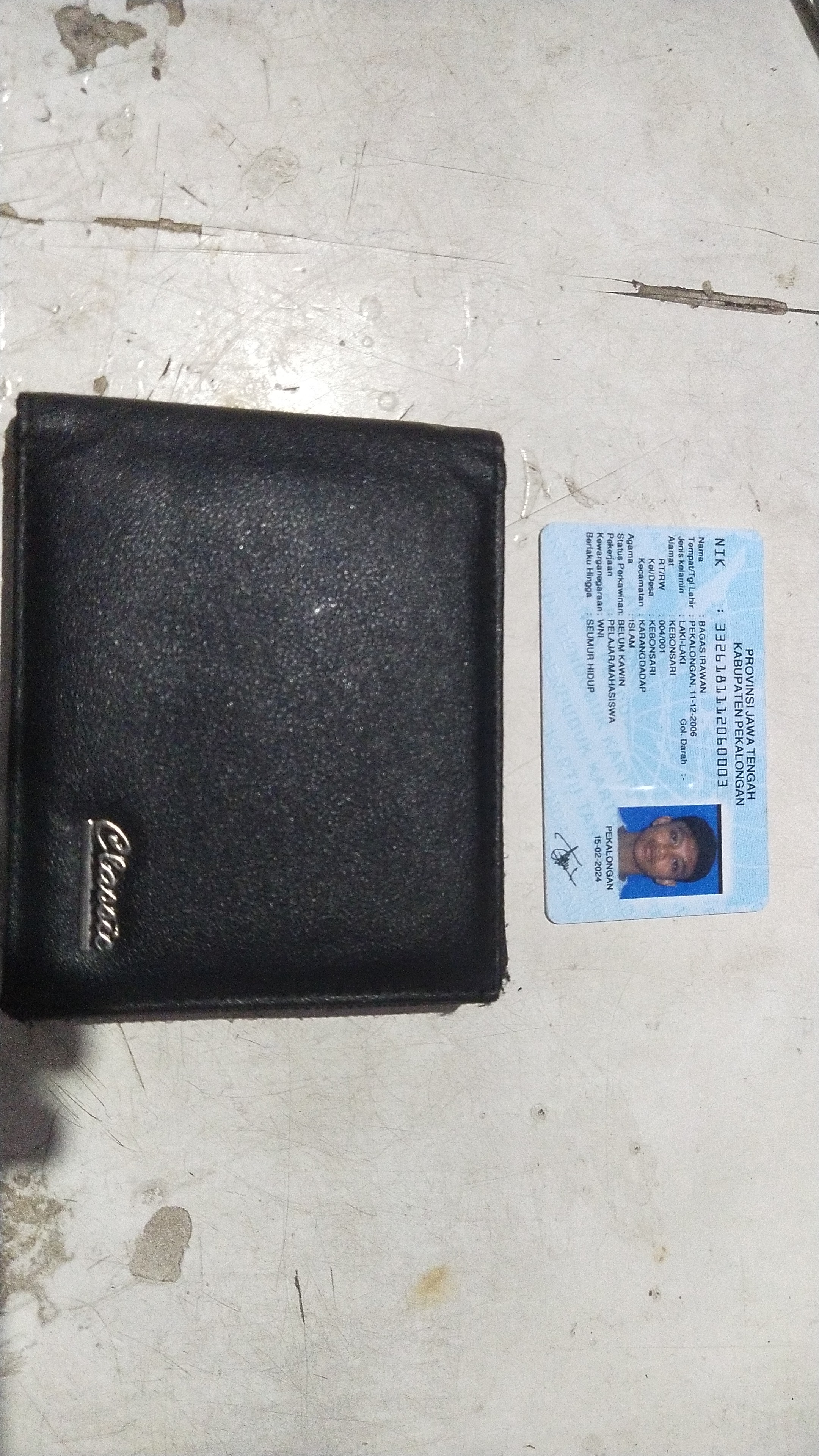 Foto laporan Dompet (TB0395)