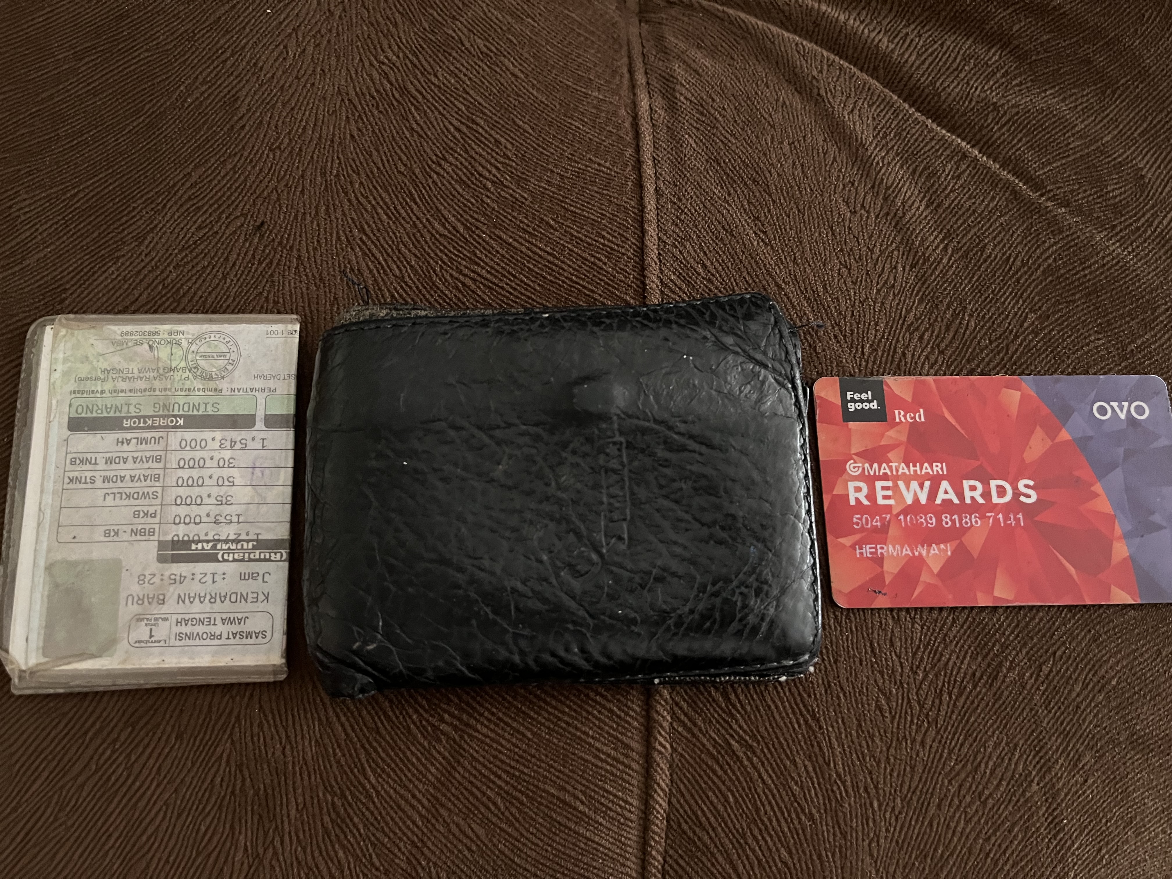 Foto laporan Dompet hitam (TB0416)