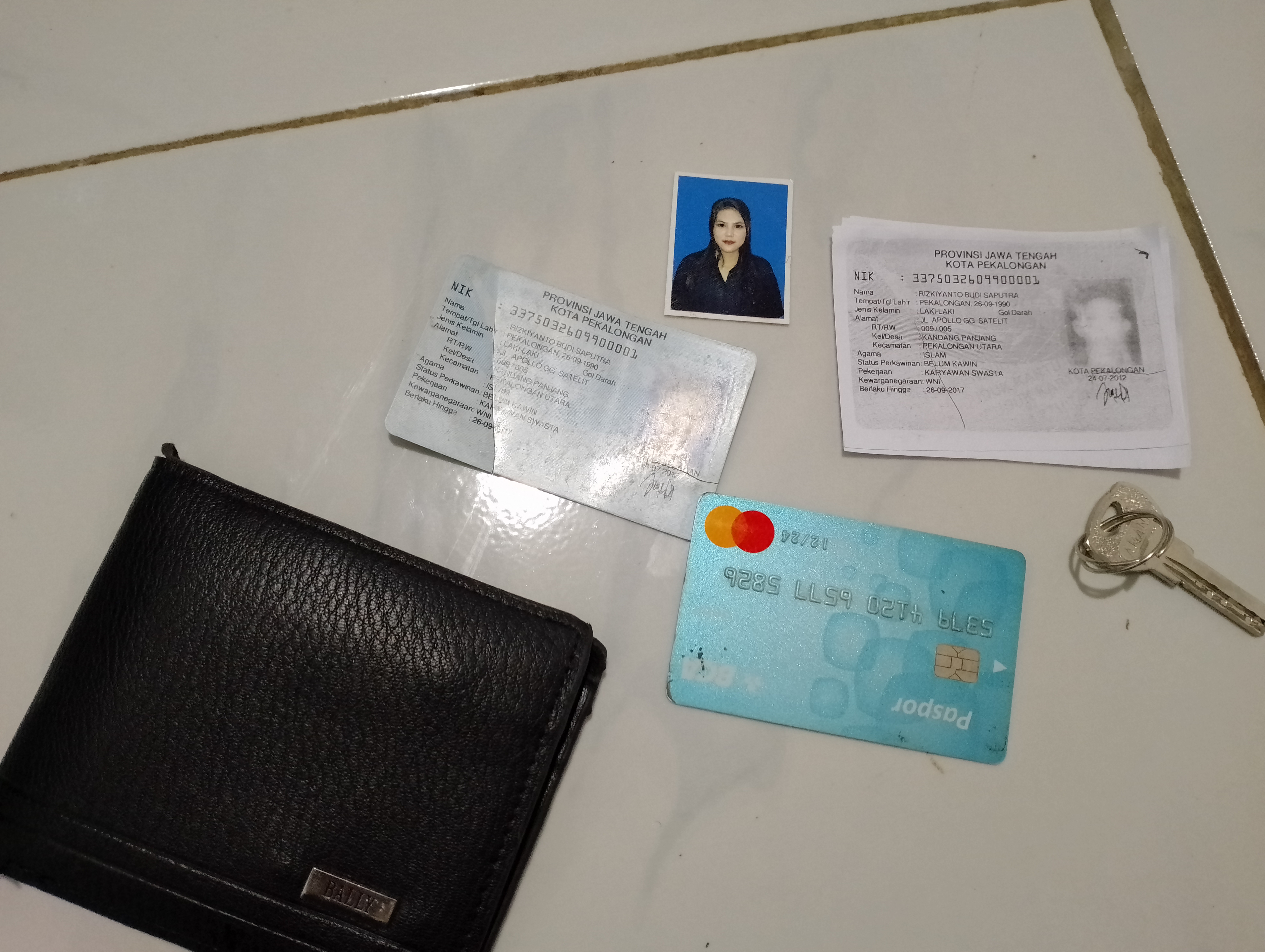 Foto laporan Dompet hitam (TB0427)
