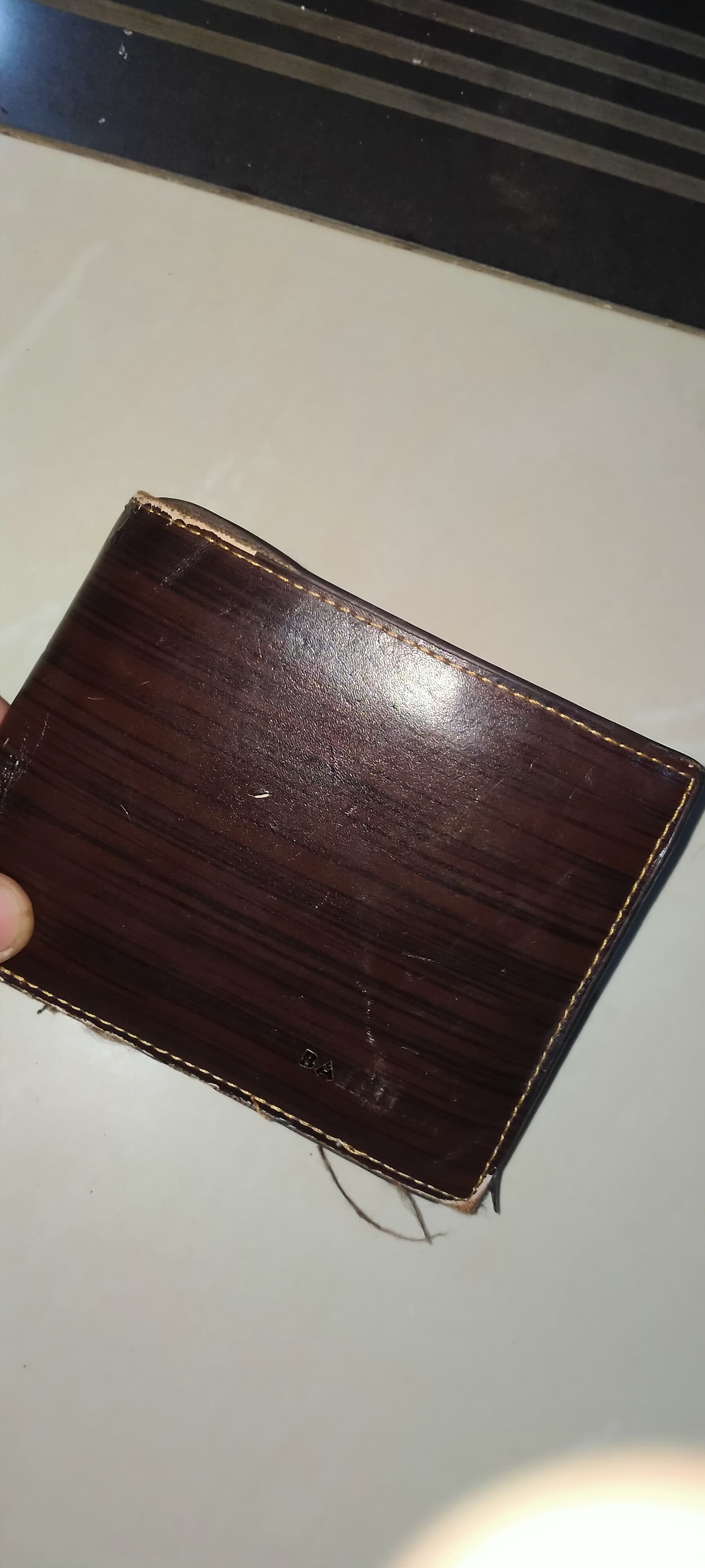 Foto laporan Dompet Coklat (TB0437)