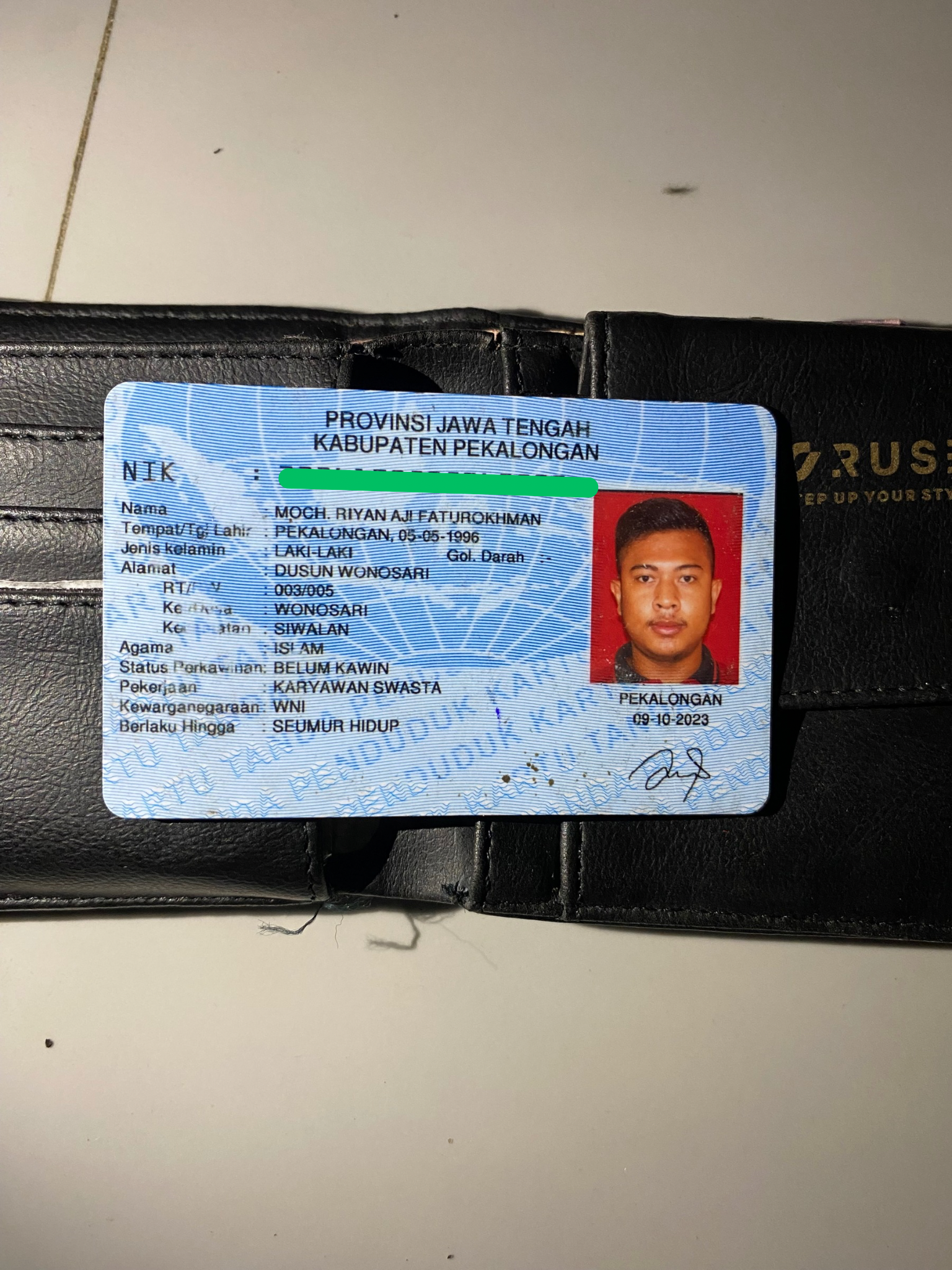 Foto laporan Dompet Hitam (TB0477)