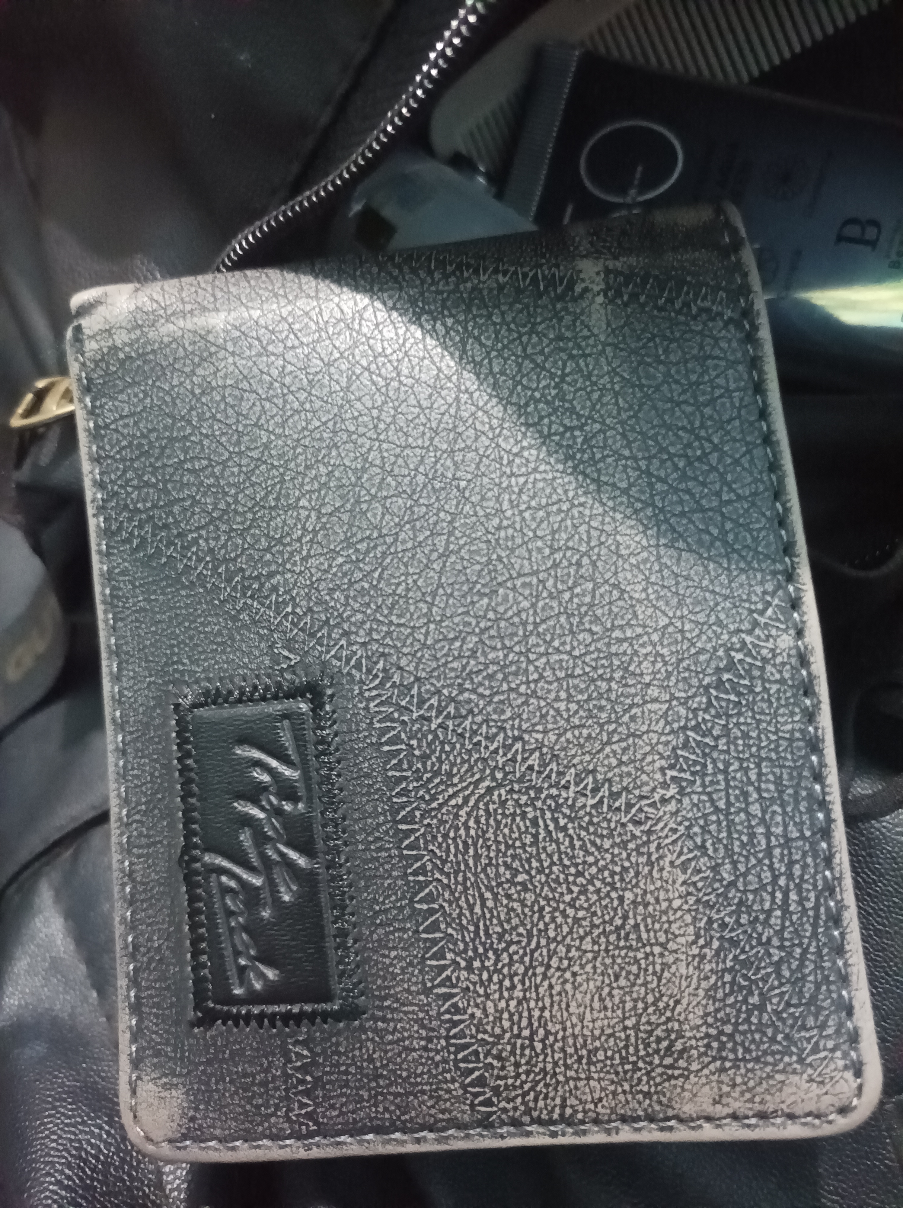 Foto laporan Dompet (TB0496)