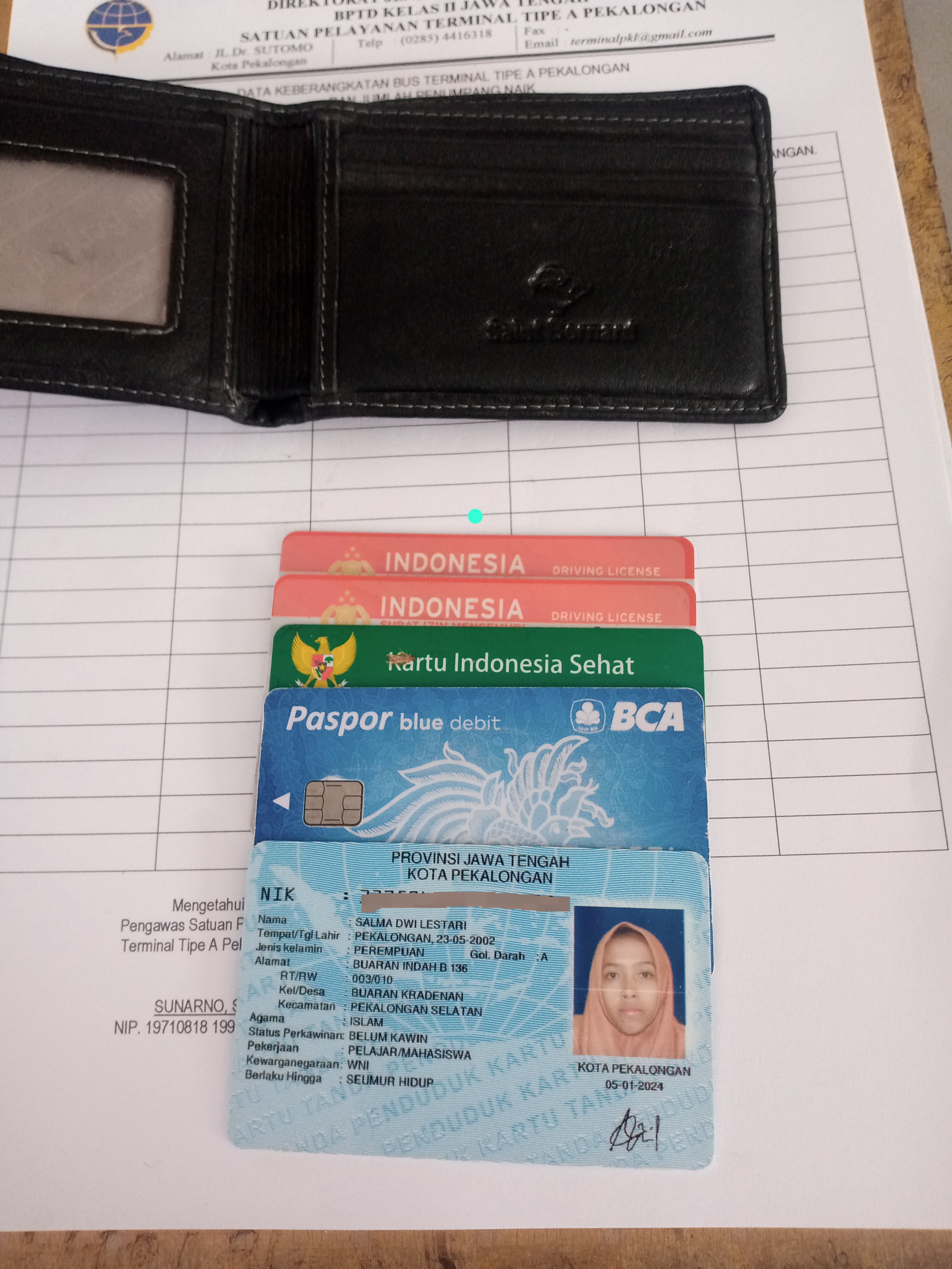 Foto laporan Dompet dan surat" ( KTP, SIM A&C, PASPOR BCA, BPJS ) (TB0497)