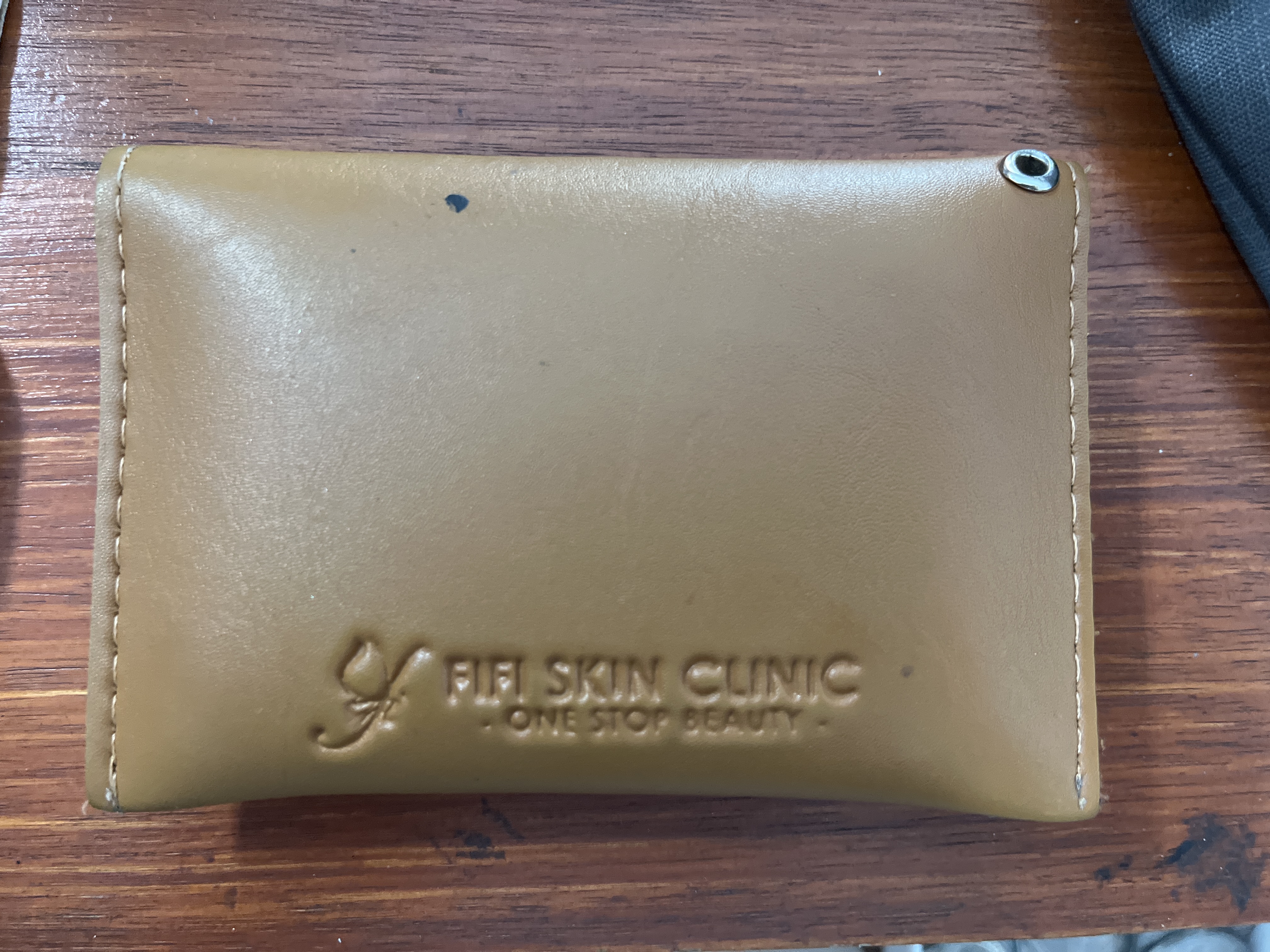 Foto laporan Dompet (TB0515)