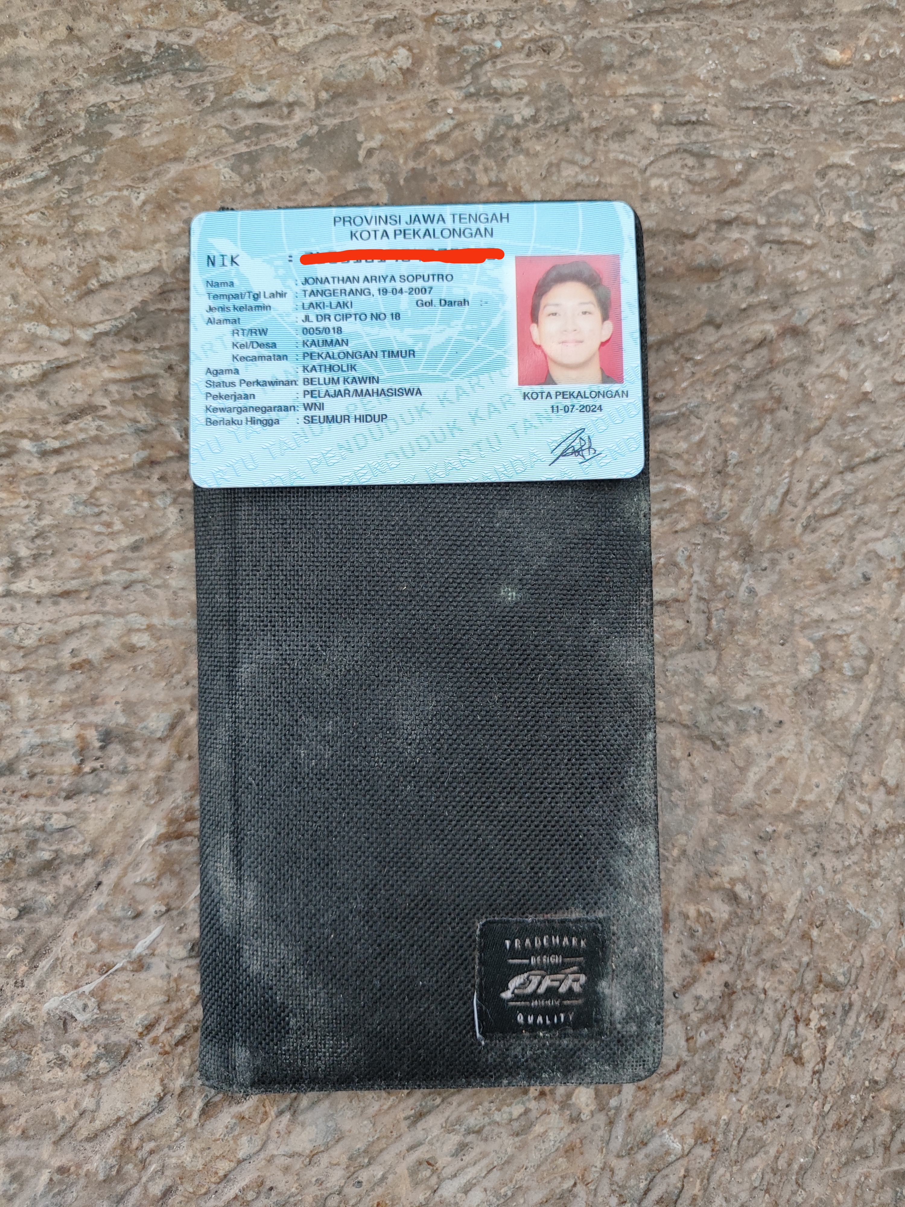 Foto laporan dompet warna hitam (TB0591)