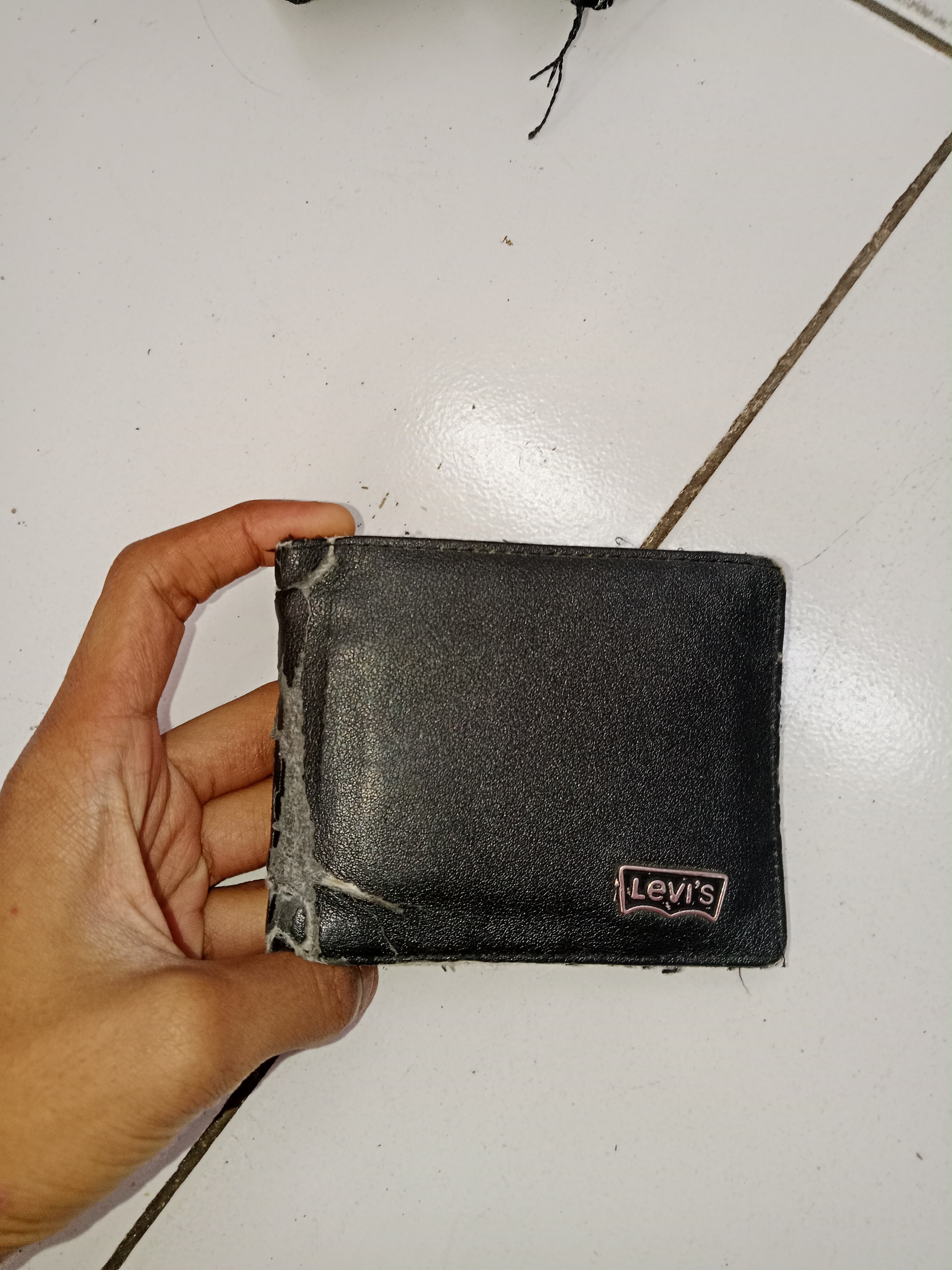 Foto laporan dompet levis pria (TB0593)