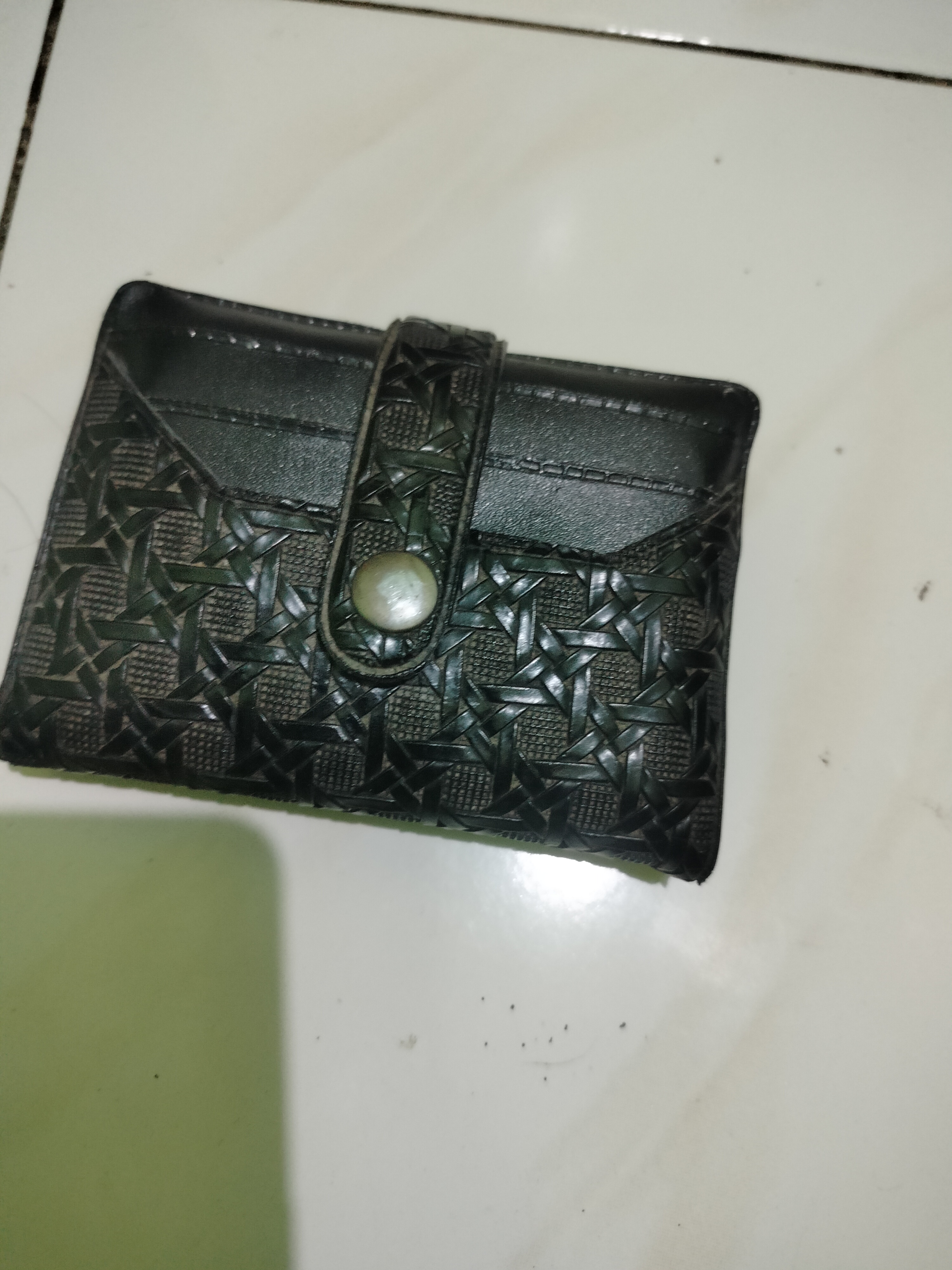 Foto laporan Dompet (TB0613)