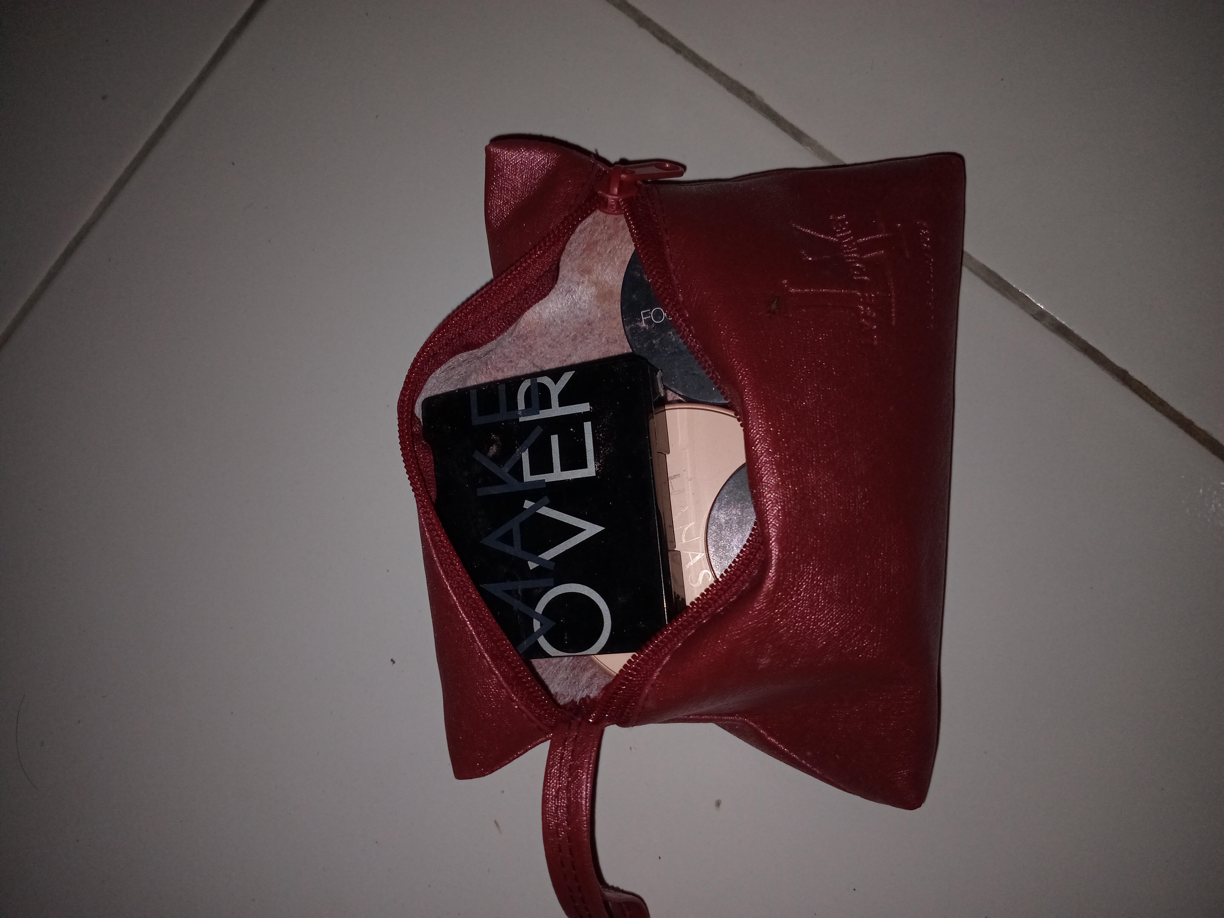 Foto laporan Dompet (TB0654)