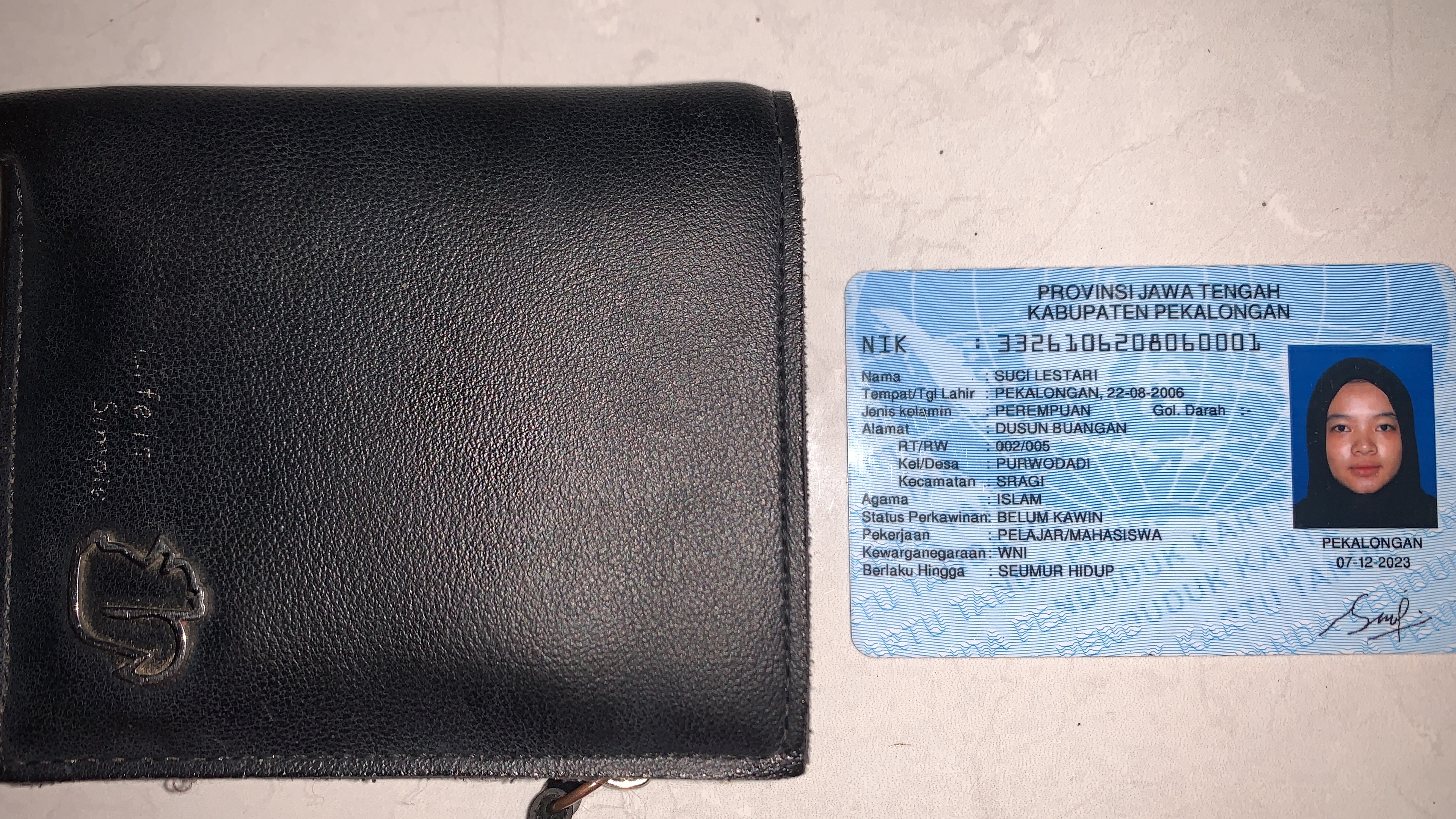Foto laporan Dompet (TB0667)