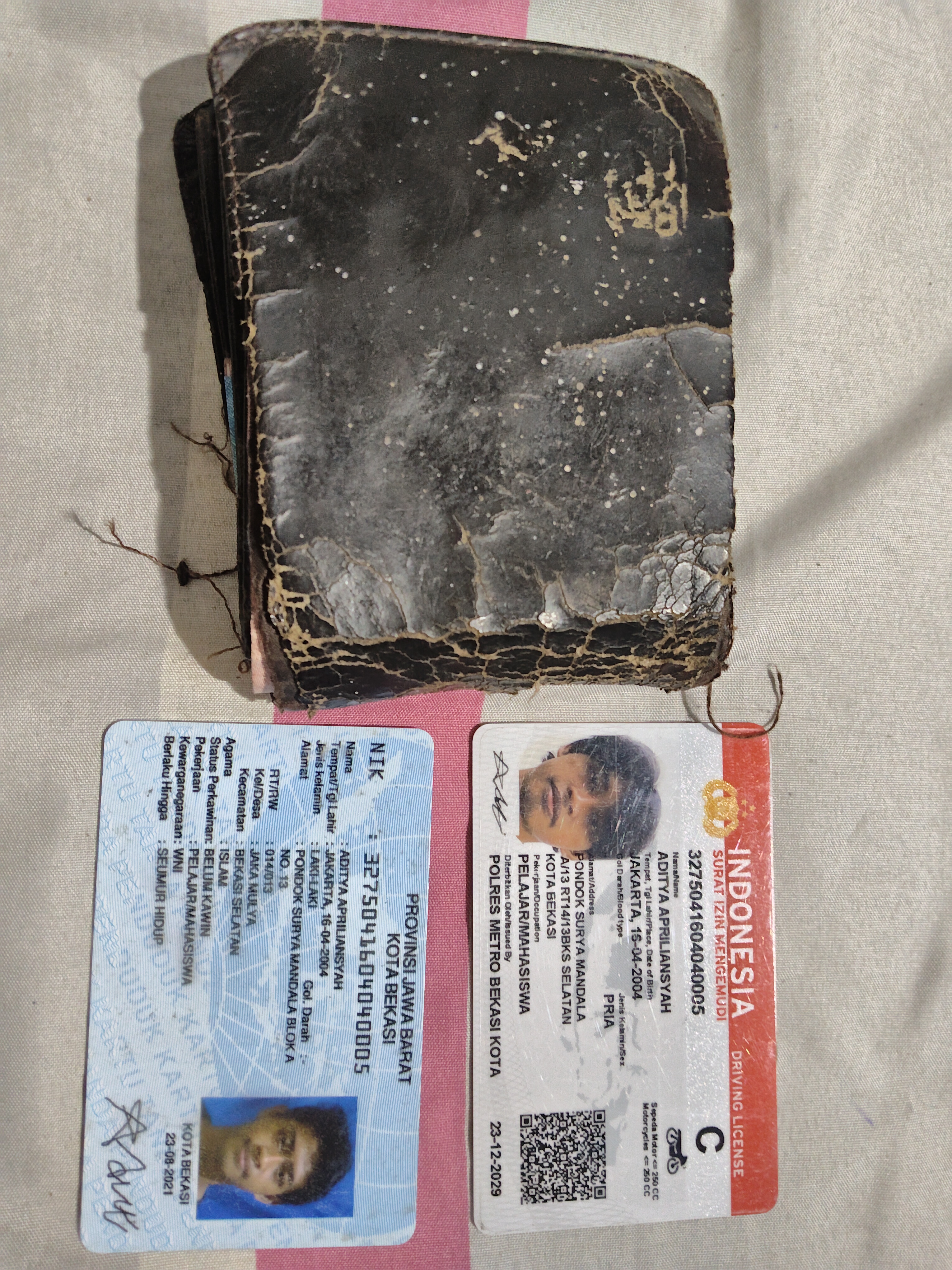 Foto laporan Dompet (TB0683)