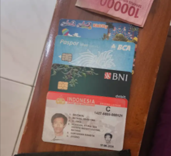 Foto laporan Dompet beserta isinya (TB0688)
