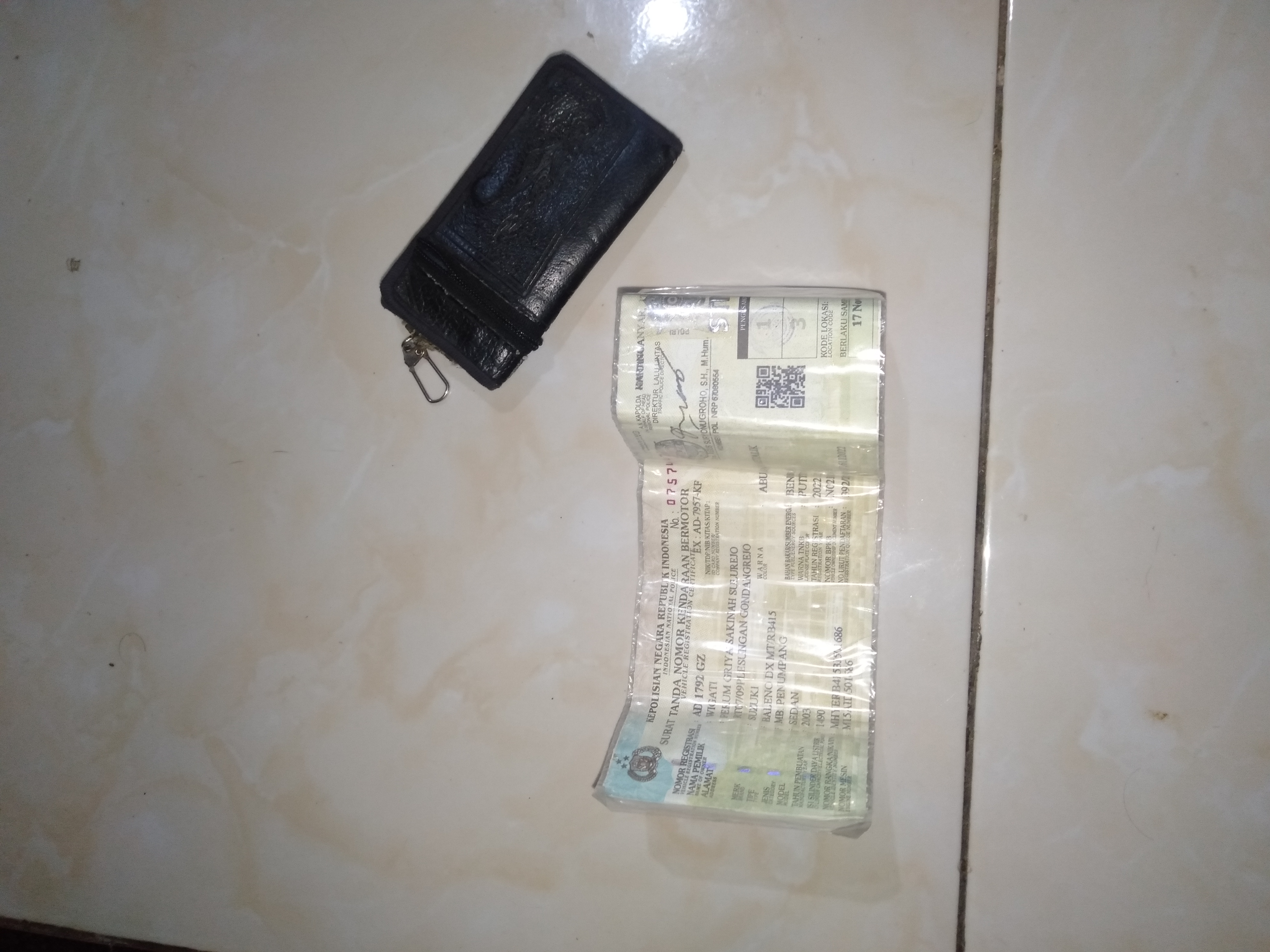 Foto laporan STNK mobil (TB0692)