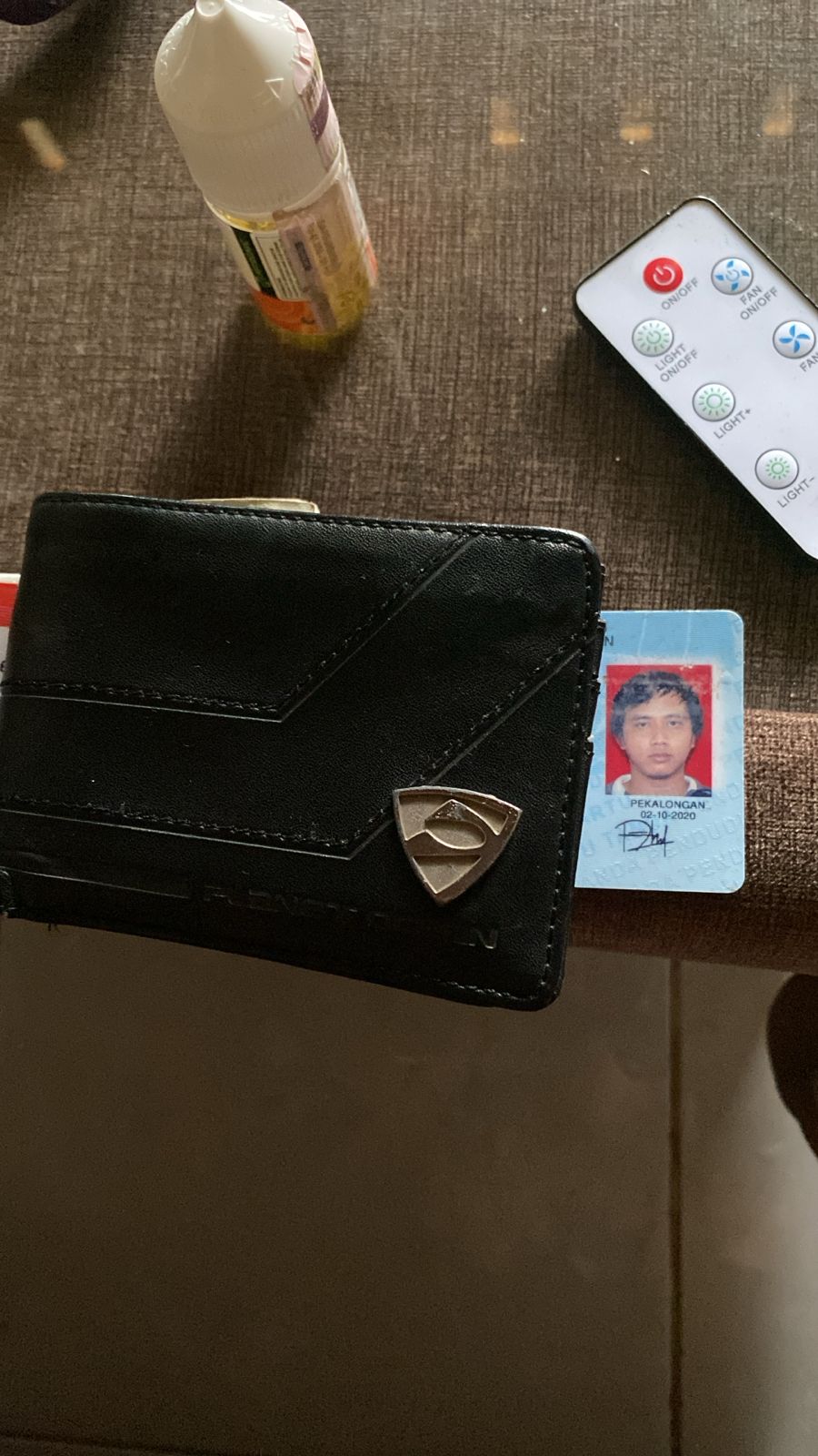 Foto laporan Dompet (TB0722)