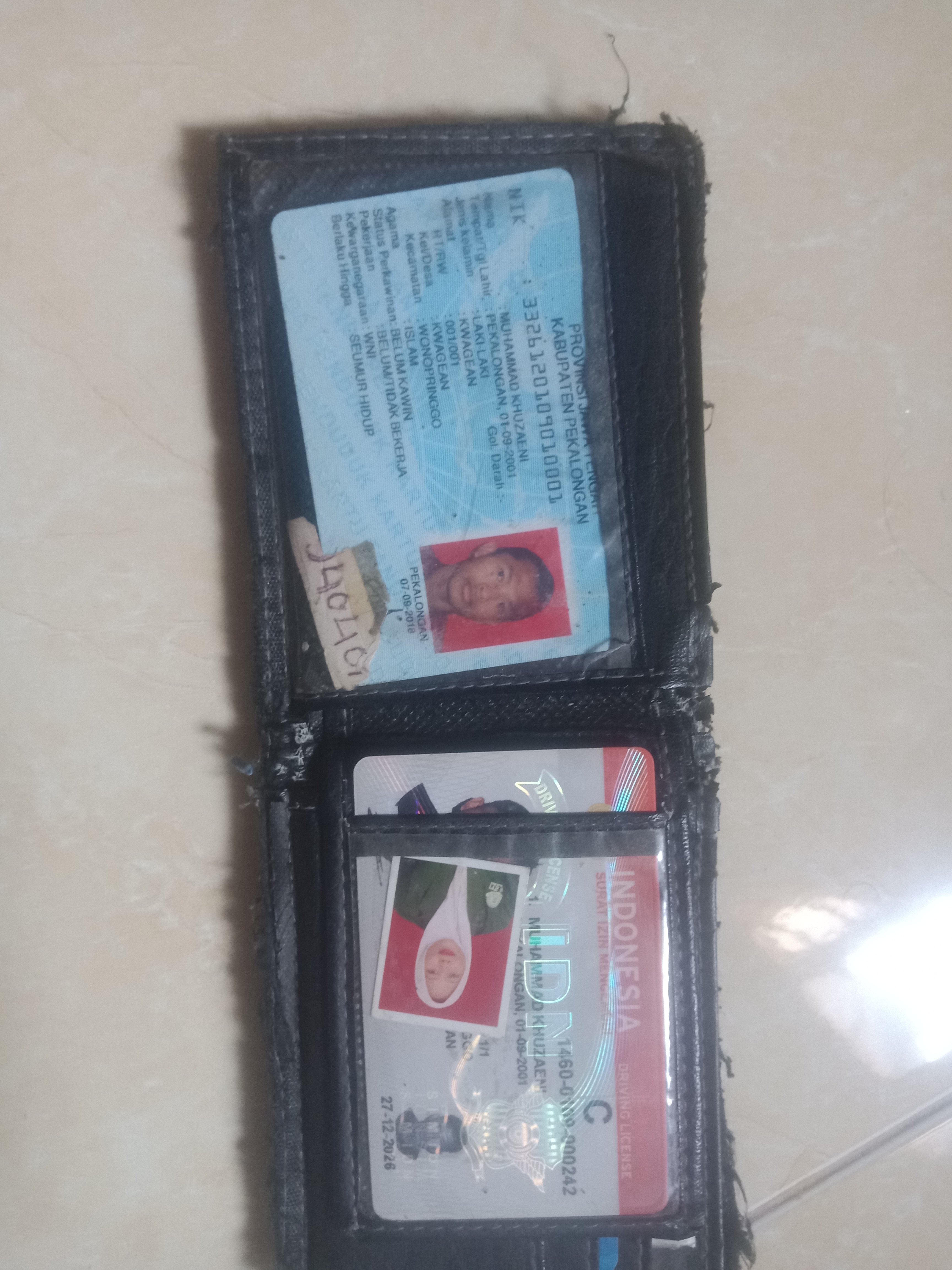 Foto laporan Dompet warna coklat (TB0744)