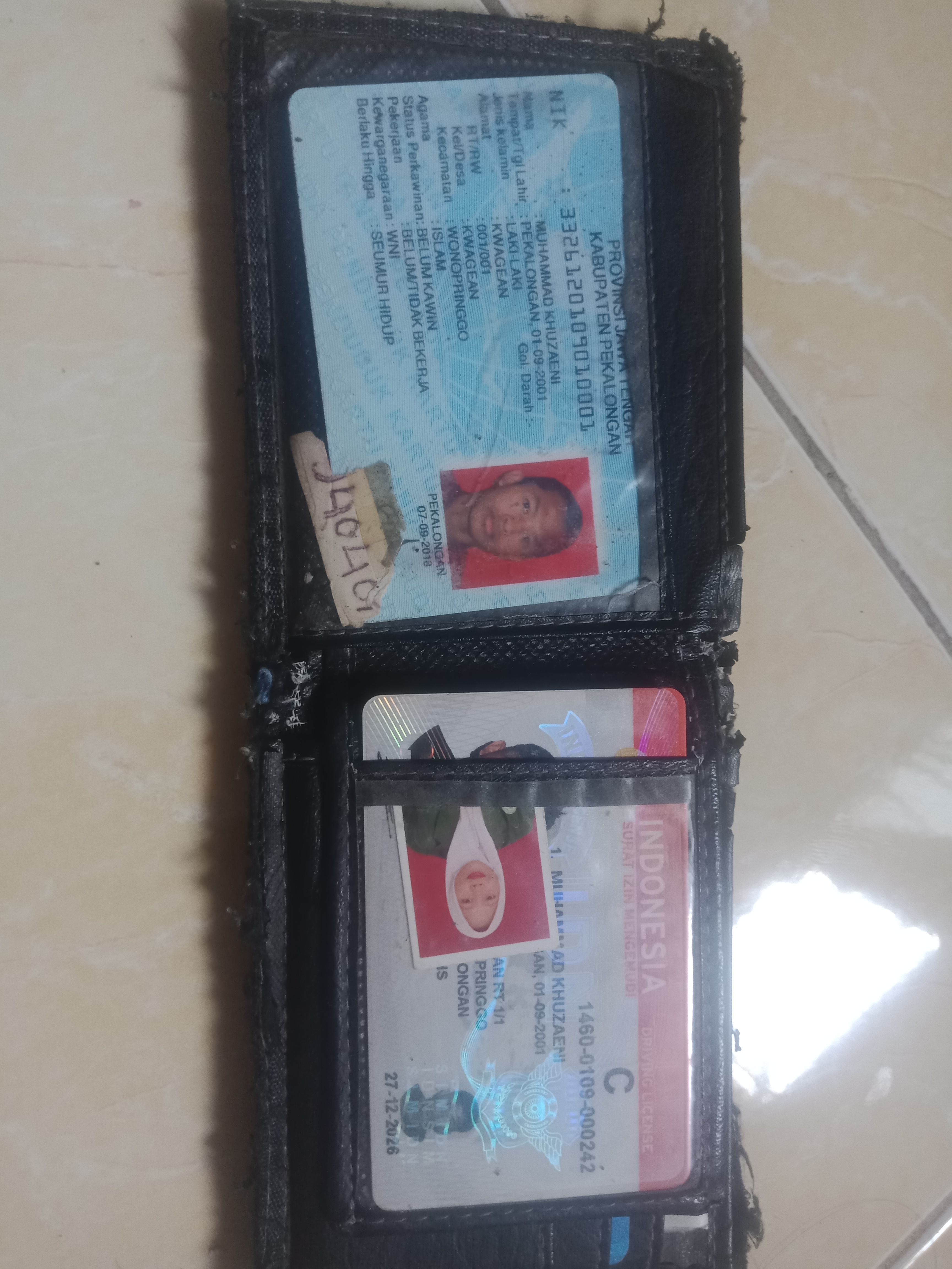 Foto laporan Dompet warna coklat (TB0745)