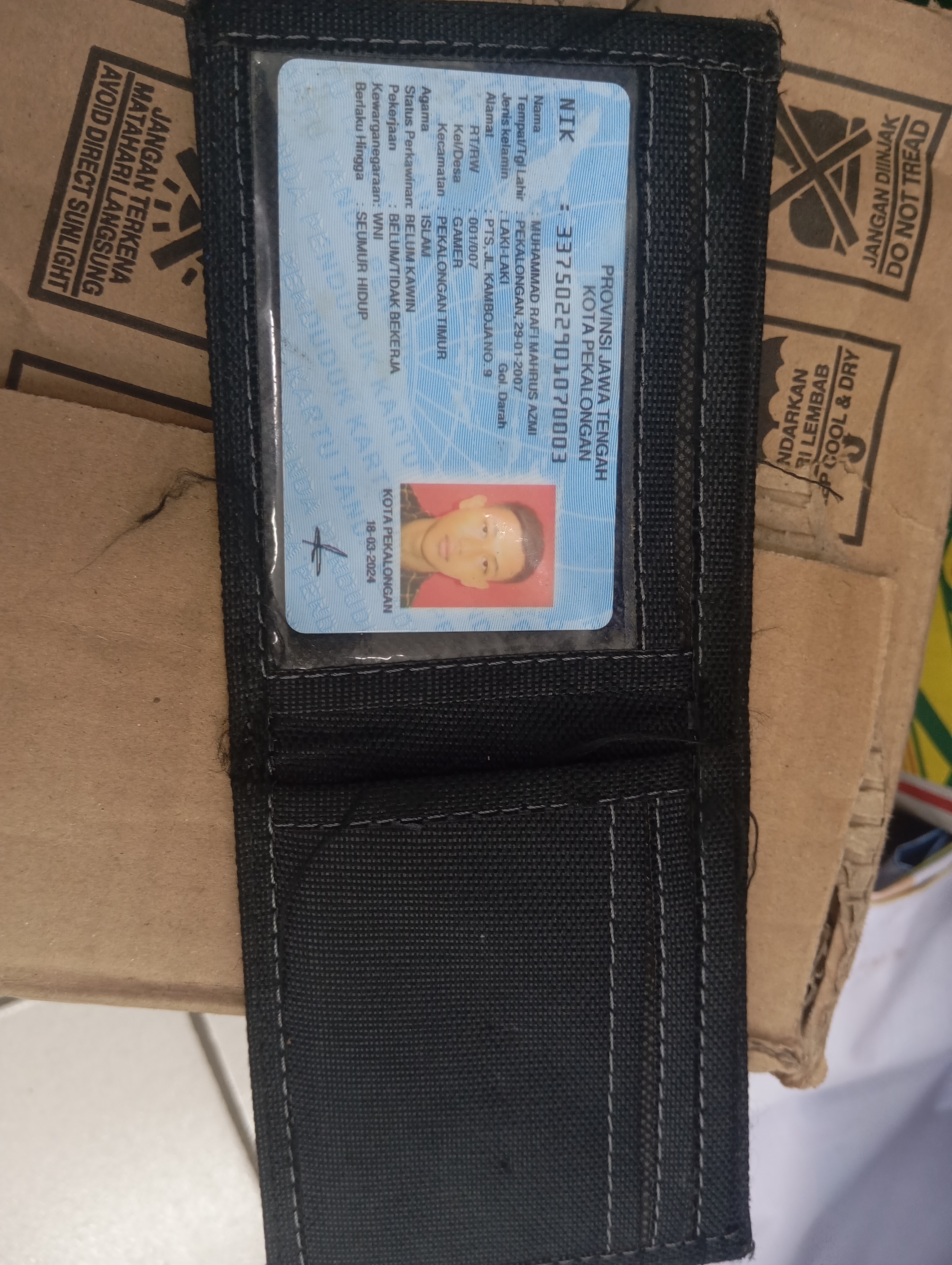 Foto laporan Dompet + ktp (TB0757)