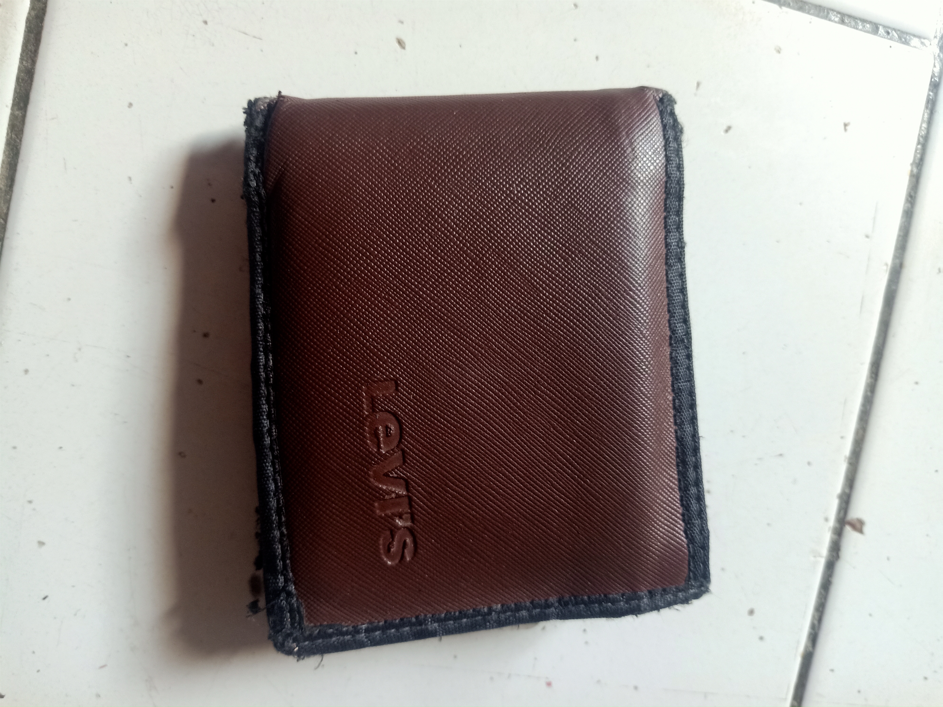 Foto laporan Dompet Pria (TB0803)