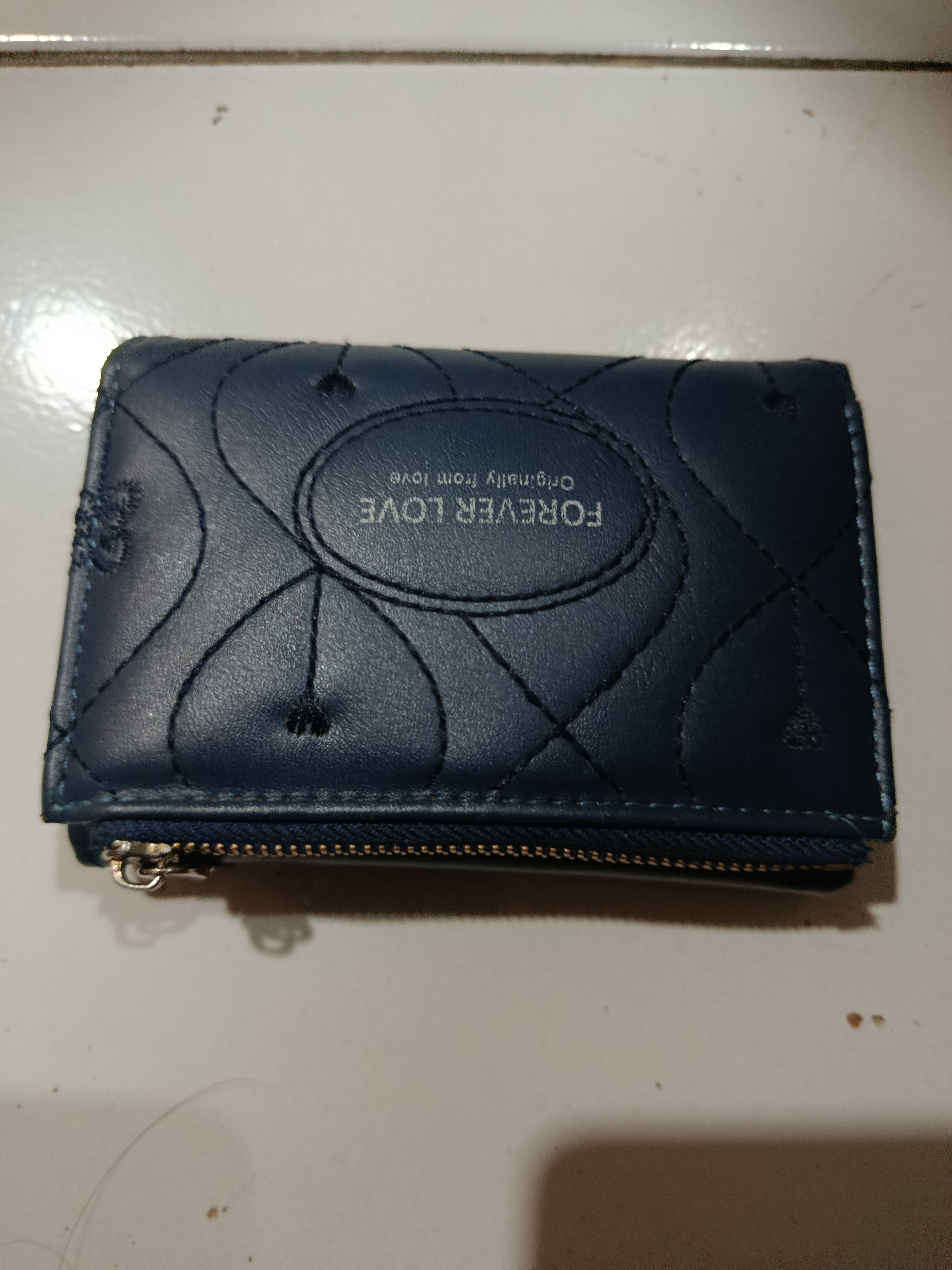 Foto laporan Dompet (TB0808)